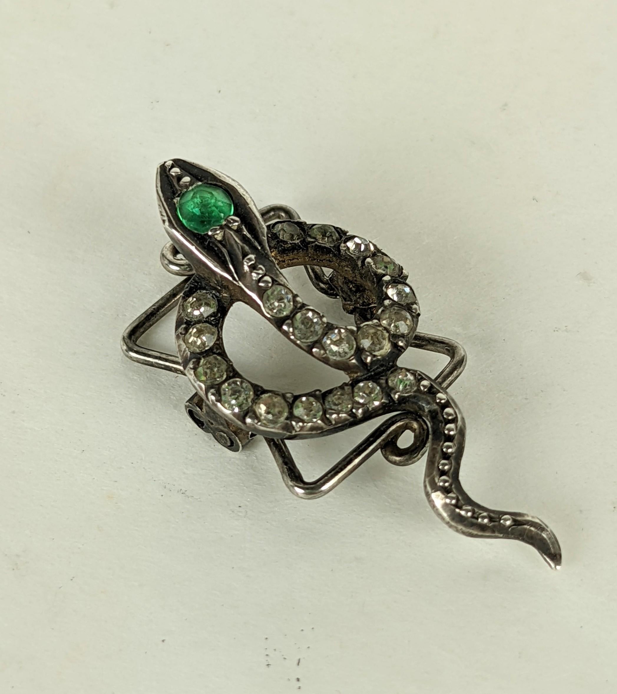 Charming Victorian Paste Snake Boutonniere or enhancer from the late 19th Century. Of French manufacture with hand set pastes in the body of the coiled snake. 
A spring mechanism on back allows the snake to be threaded with pearls/beads (8mm max) or