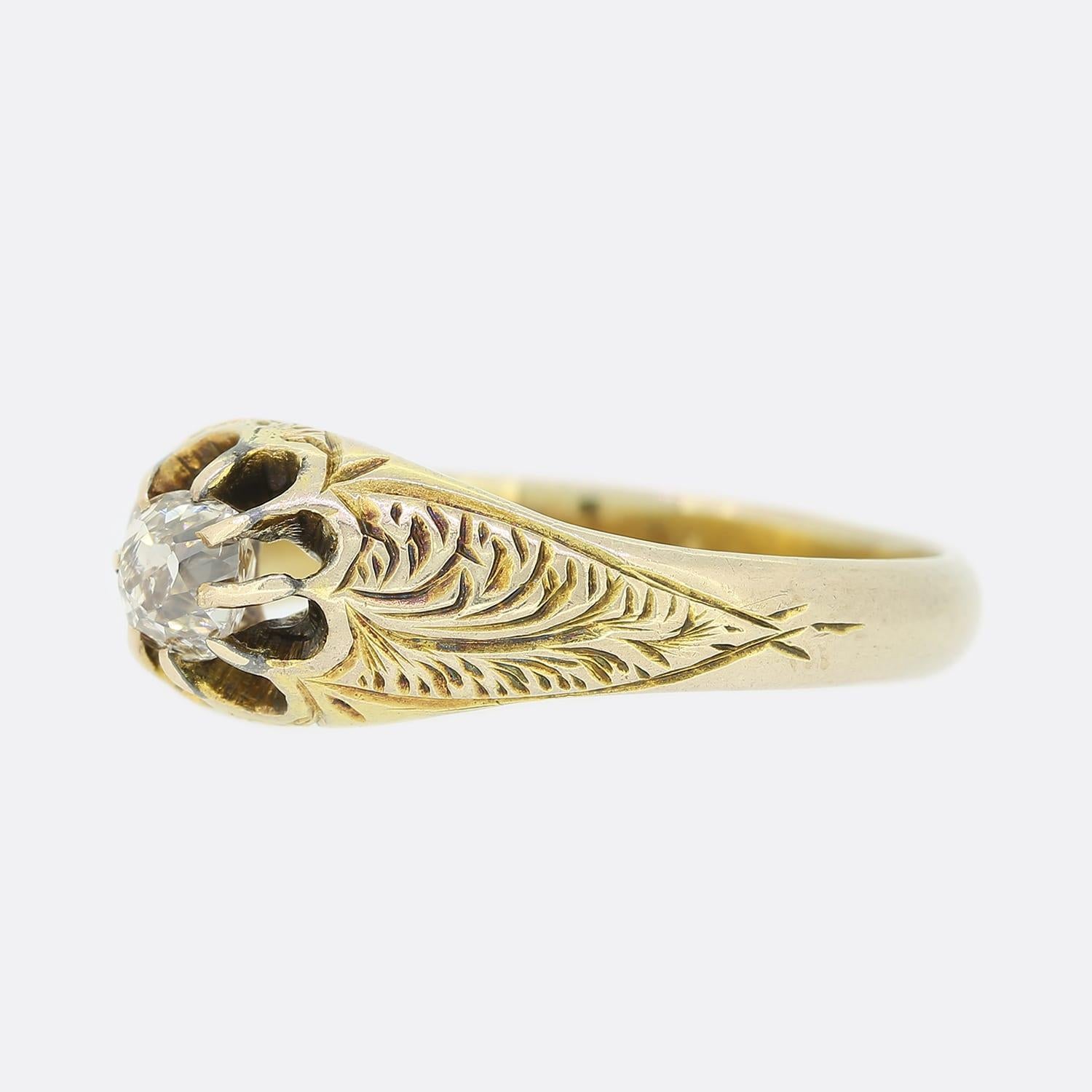 This is a victorian 15ct yellow gold diamond gypsy ring. The shoulders of the ring feature a lovely hand-crafted pattern which leads up to the claw set old mine cut diamond. We love the slight tarnish on the ring as we believe it adds to the patina,