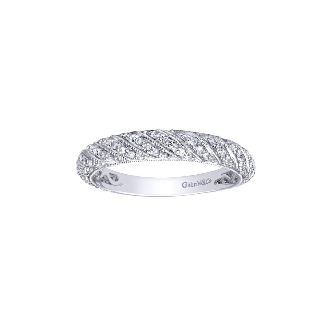Victorian pave design diamond band in 14k white gold by bridal designer Gabriel Co. Band contains 0.13 ctw of fine white round diamonds, H color, SI clarity. Band is suitable as a fashion ring, anniversary ring, a wedding band or a stackable ring.