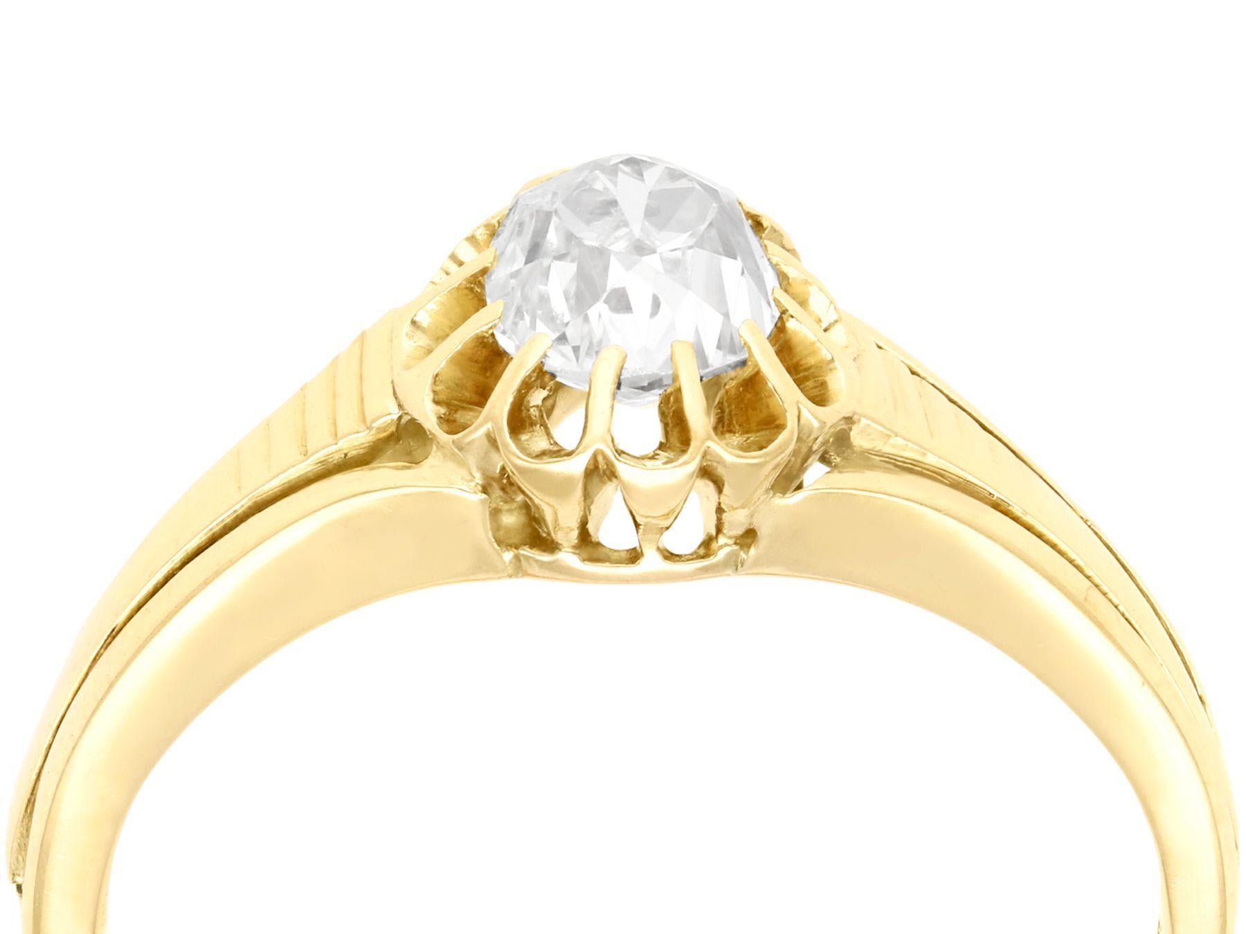 A stunning, fine and impressive antique 0.98 carat diamond and 15 karat yellow gold solitaire ring; part of our diamond jewelry and estate jewelry collections.

This stunning antique diamond solitaire ring has been crafted in 15k yellow gold.

The