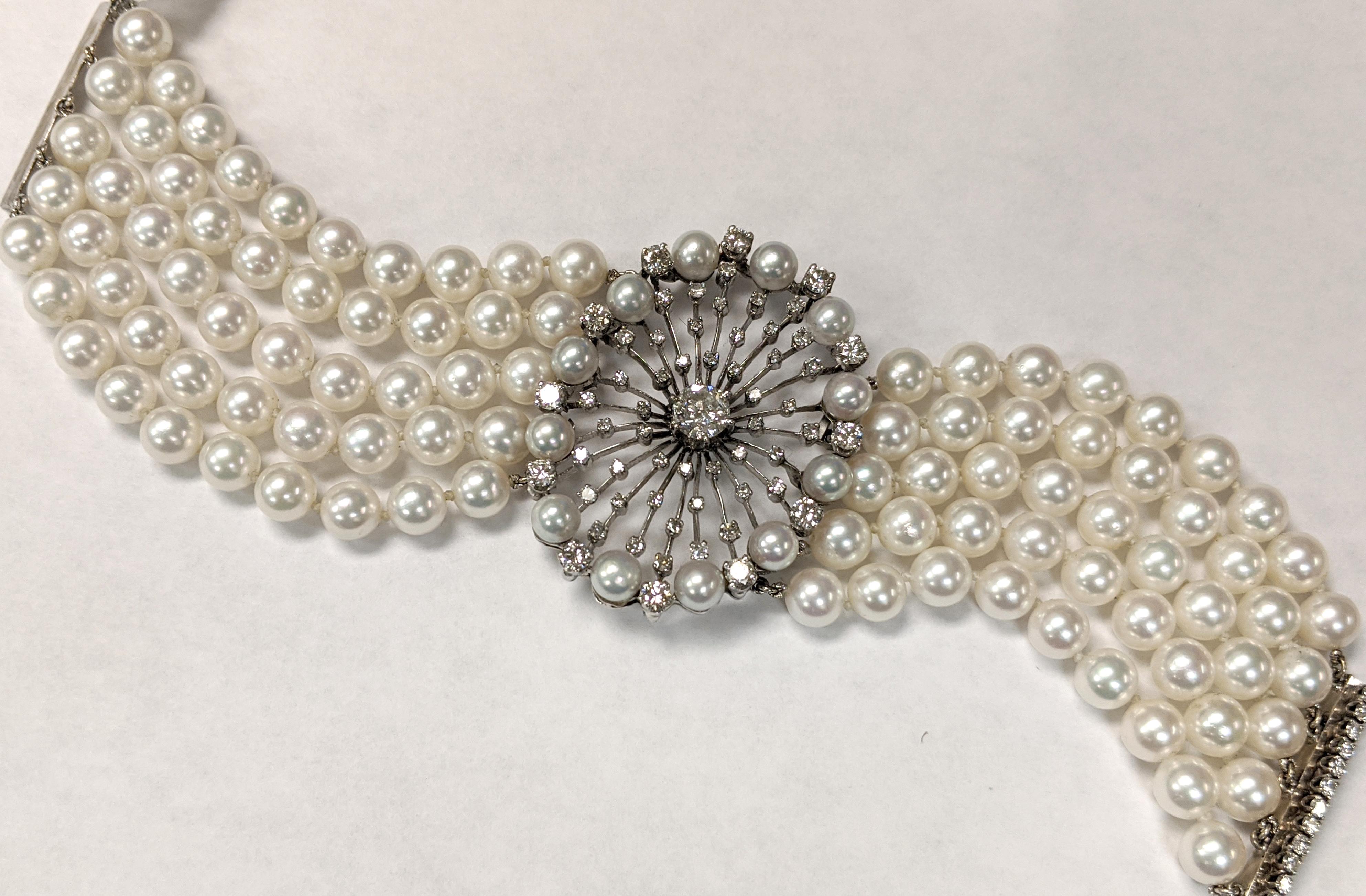 A five-strand pearl bracelet from the Victorian Era, featuring nearly 100 round white pearls. In the center of the bracelet is an oval open metalwork medallion studded with diamonds.

The centerpiece features an old European-cut diamond in the