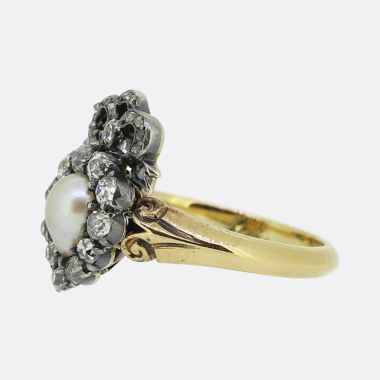 Here we have a lovely example of a Victorian heart ring. In this case, a pear shaped natural pearl has been focally set at the centre of the face. This principle stone has then been framed by a single row of round faceted old cut diamonds and
