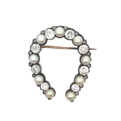 Broche victorienne en forme de fer à cheval avec perles et diamants
