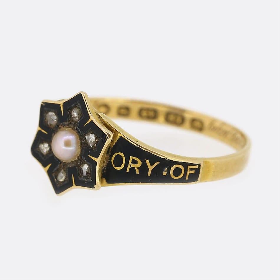 This is an exquisite mourning ring from the mid Victorian era. The ring plays host to a central natural pearl surrounded by 6 rose cut diamonds. The ring has been very well preserved and the enamel is in excellent condition. Inside the ring there is