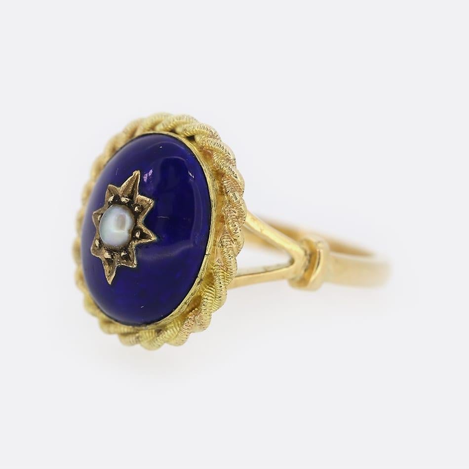 This is a Victorian 18ct yellow gold enamel and pearl ring. The natural pearl sits in a star setting and the surrounding enamel is in pristine condition. It has a closed back which was common practice during this period and the meticulous attention