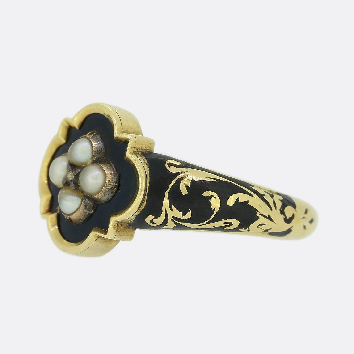 This is a wonderfully hand made yellow gold Victorian mourning ring. The ring is set with a central rose cut diamond in a cut collet setting and is surrounded by four original natural pearls. Fine black enamelling fills a shielded face and continues