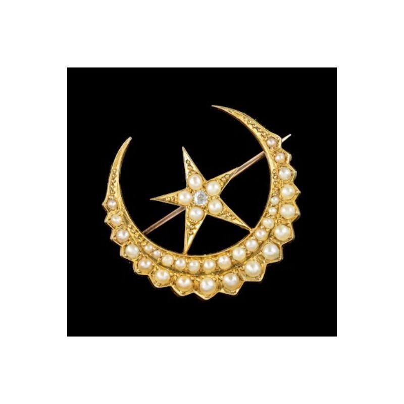 A beautiful antique Victorian celestial brooch depicting a crescent moon and star. It’s fashioned in 18ct gold and lined with glowing, natural seed pearls, simulating moonlight and a twinkling old mine cut diamond in the centre to give the star its