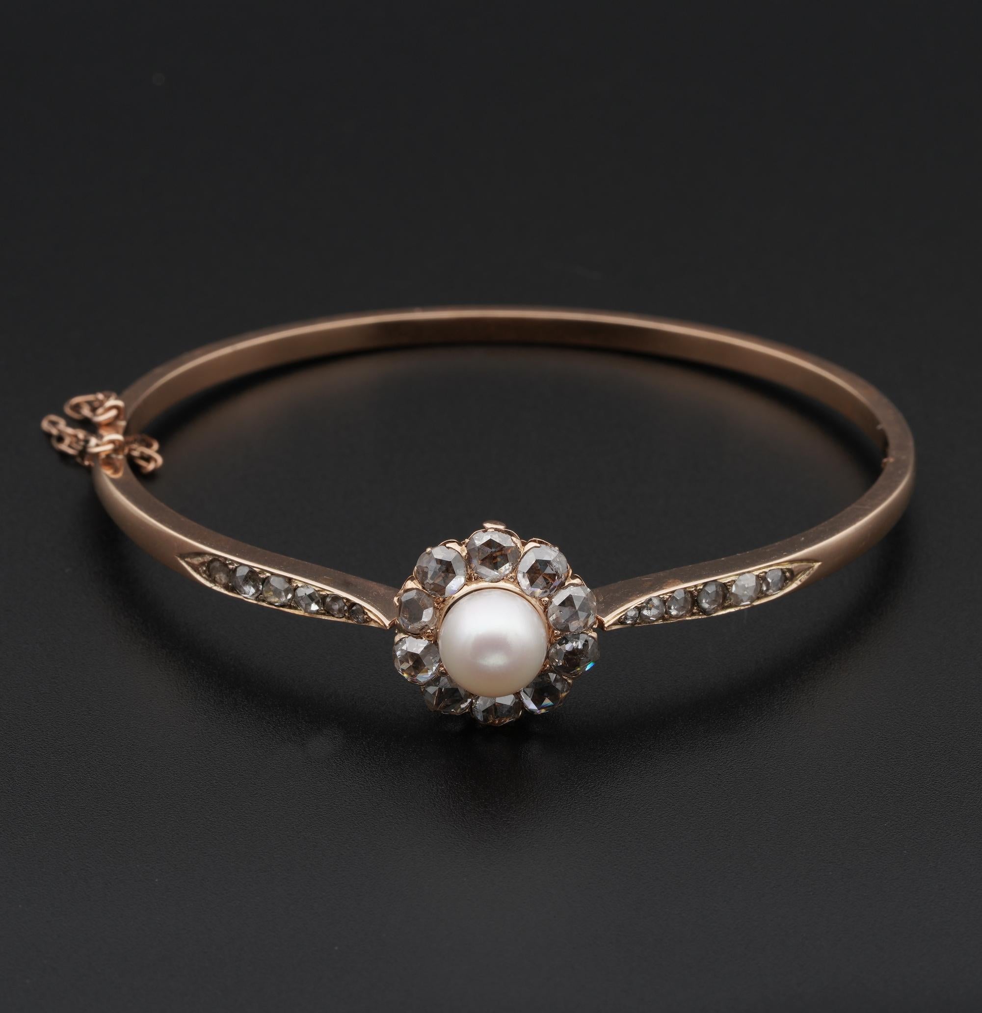 Simply exquisite Victorian era bangle 1870 ca; hand crafted as unique of solid 18 Kt rose gold not marked.
Charming Daisy of Diamonds centred by a Pearl gem with further Diamonds chasing the sides. This was what a lady of the Victorian period used