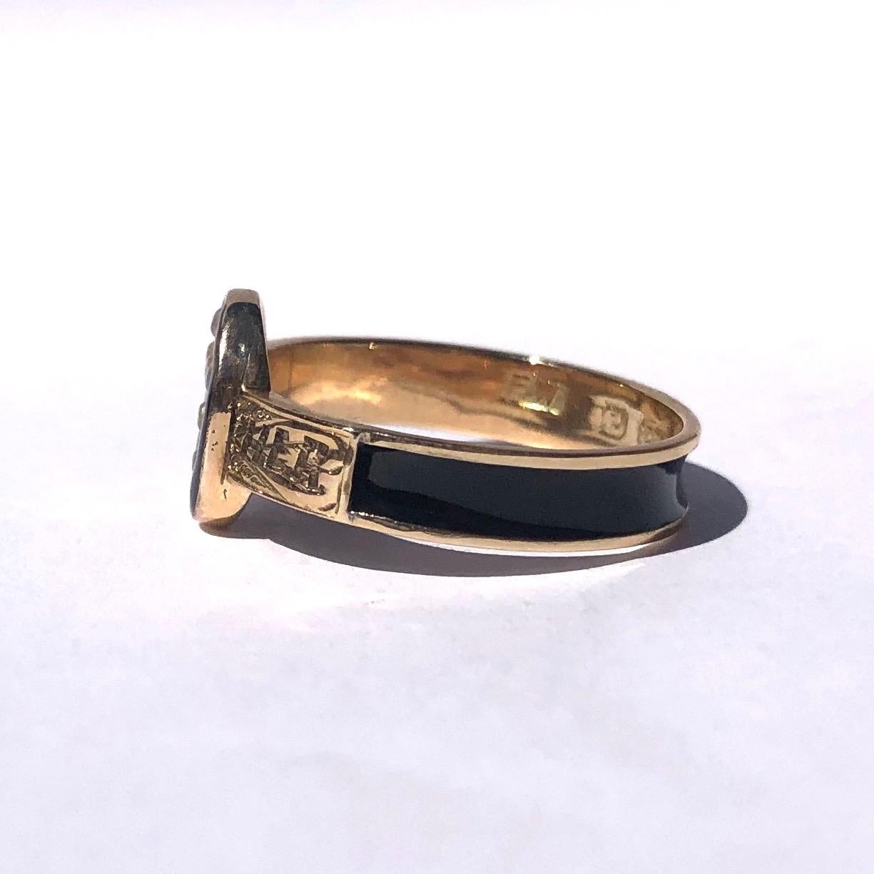 The main feature of this mourning band is a panel holding a pearl cross and black enamel which surround sit. The shoulders are finely engraved and the rest of the band has black enamel detail. Made in Birmingham, England. 

Ring Size: N 1/2 or
