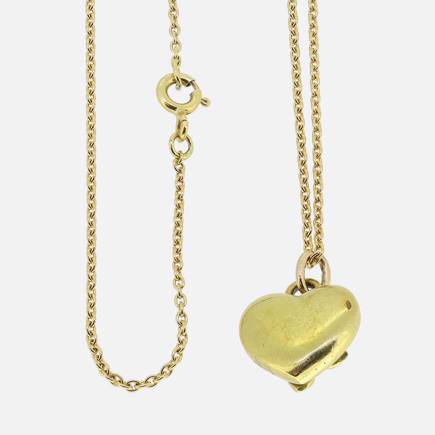 Here we have a wonderful pearl set pendant necklace. This antique pendant has been crafted from 18ct yellow gold into the the shape of a little love heart and expertly set with a quintet of perfectly matched round natural pearls in a floral