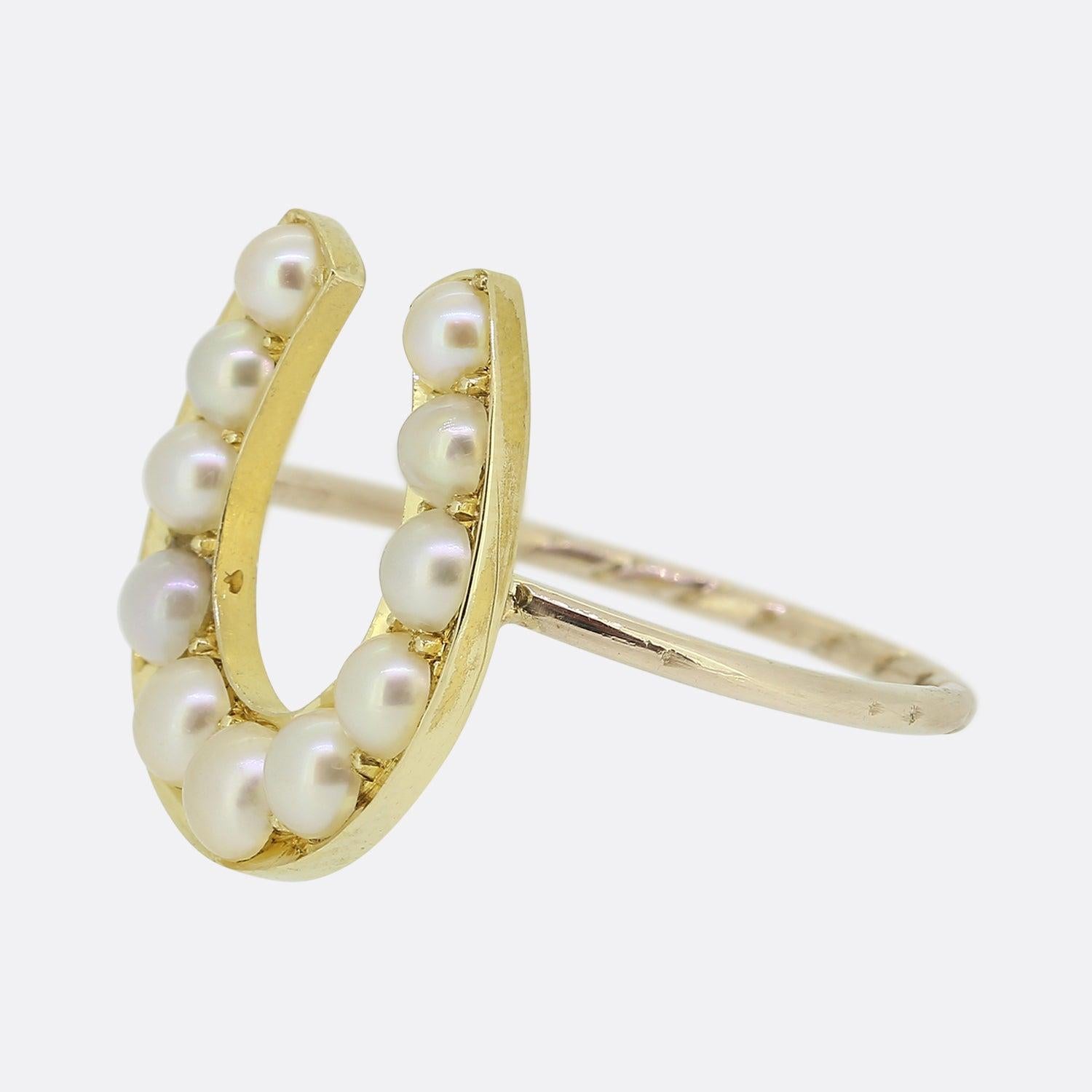 Here we have a fabulous natural pearl ring originally dating back to the Victorian era. The face has been crafted into the shape of a lucky horseshoe, a common symbol associated with jewellery of the time with each being individually claw set and