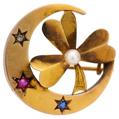 Victorian pearl ruby diamond sapphire 14k yellow gold crescent clover brooch