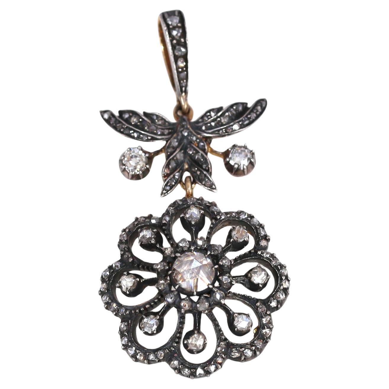 Victorian Pendant Rose-Cut Diamonds Flower, 1890
Victorian Rose-cut Diamonds Pendant depicting a flower. A fine pendant consists of three parts interlinked to be moving freely on the body. This a superb example of the late Victorian era. Executed