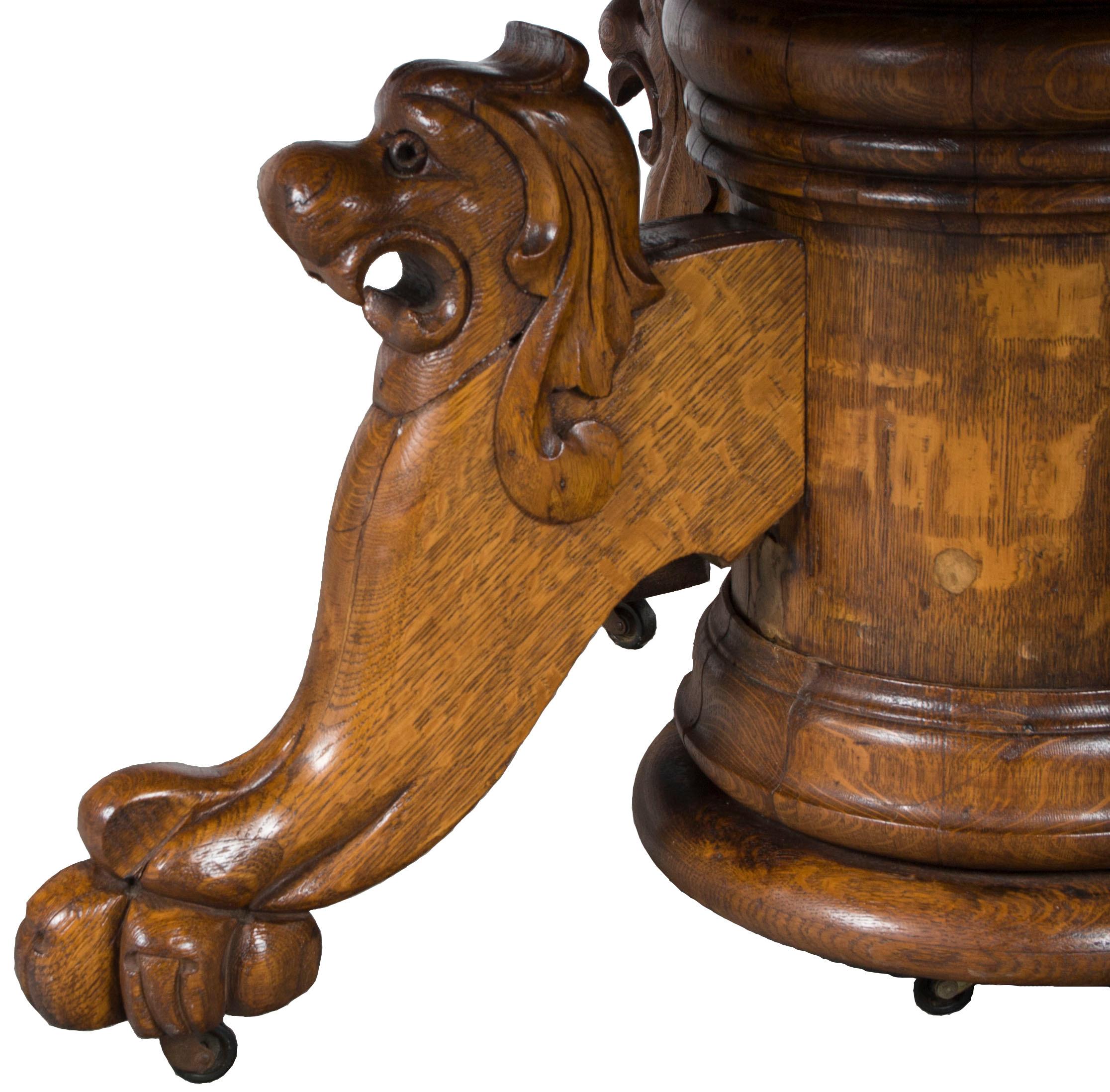 Late Victorian Victorian Period Carved Oak Lion Head Pedestal Oval Dining Table