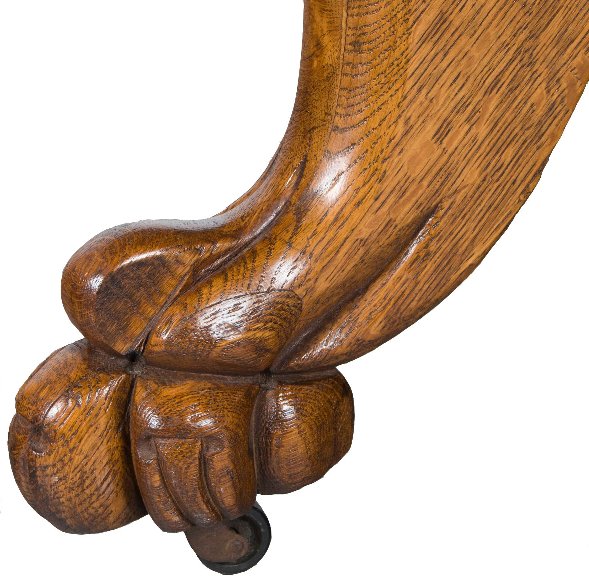 English Victorian Period Carved Oak Lion Head Pedestal Oval Dining Table