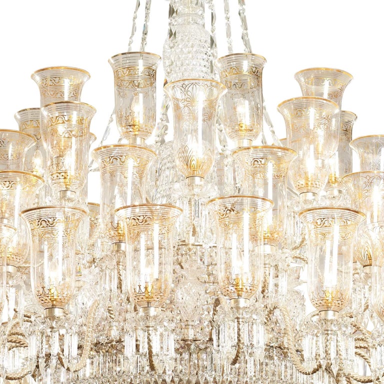 Victorian period cut glass and parcel-gilt chandelier by F & C Osler
English, circa 1870
Dimensions: Height 310cm, diameter 198cm

This magnificent chandelier is exquisitely crafted from handcut and parcel gilt glass, designed by 19th century