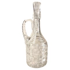 Carafe en verre taillé et tissé en panier d'époque victorienne