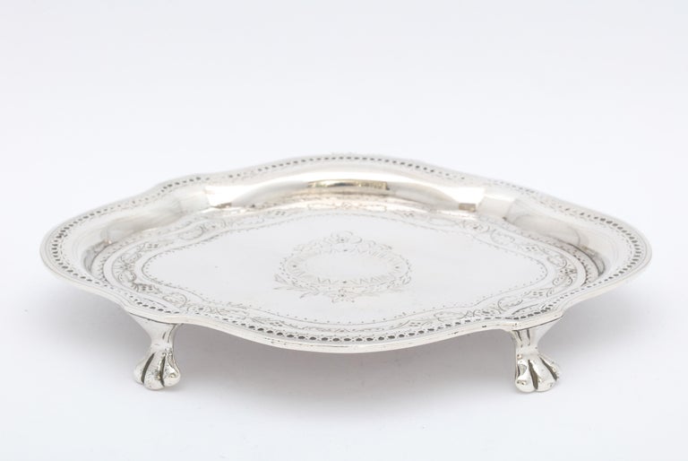 Victorian Period, sterling silver, paw-footed salver/tray, having 8 rounded sides, London, year-hallmarked for 1865, Robert Harper - maker. Lovely etched design. Vacant cartouche. Measures 7 1/2 inches wide x 6 inches deep x 1 inch high. Weighs