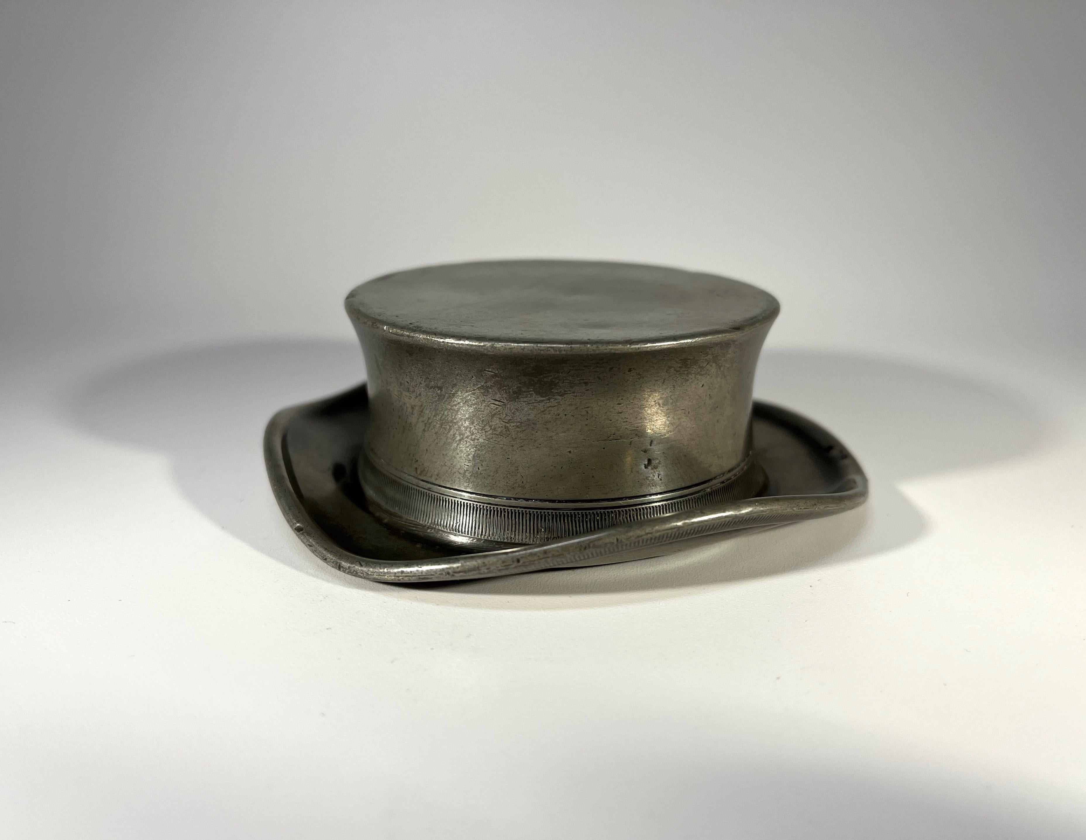 Victorian pewter gentleman's Pickwickian Hat paperweight 
This Dickensian piece makes for a novel desk accessory
Typical aged patina on this cherished piece
Height 1.25 inch, Diameter 3.75
In good condition
Wear consistent with age and use