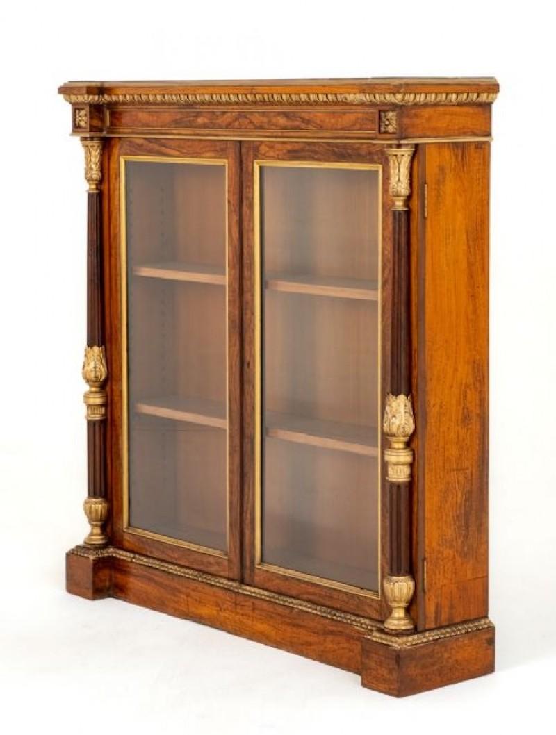 Impressive Olive Wood Pier Cabinet.
Circa 1850
This Cabinet Stans Upon a Plinth Base.
The Cabinet Features 2 Glazed Doors.
The Doors Being Flanked by Turned and Carved Columns Capped with Carved Decoration.
The Top and Bottom Moldings also being of