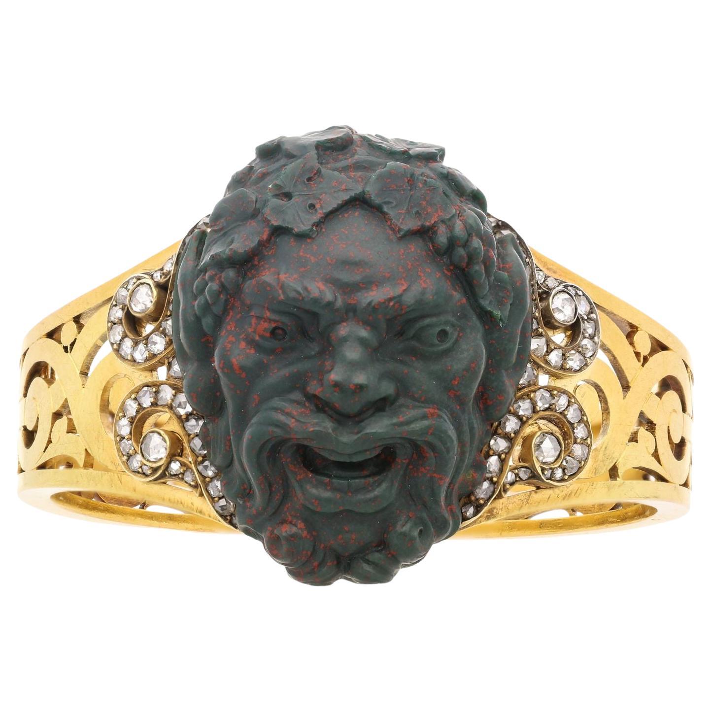 Bracelet jonc victorien en or percé avec tête de Bacchus en pierre de sang finement sculptée, vers 1880