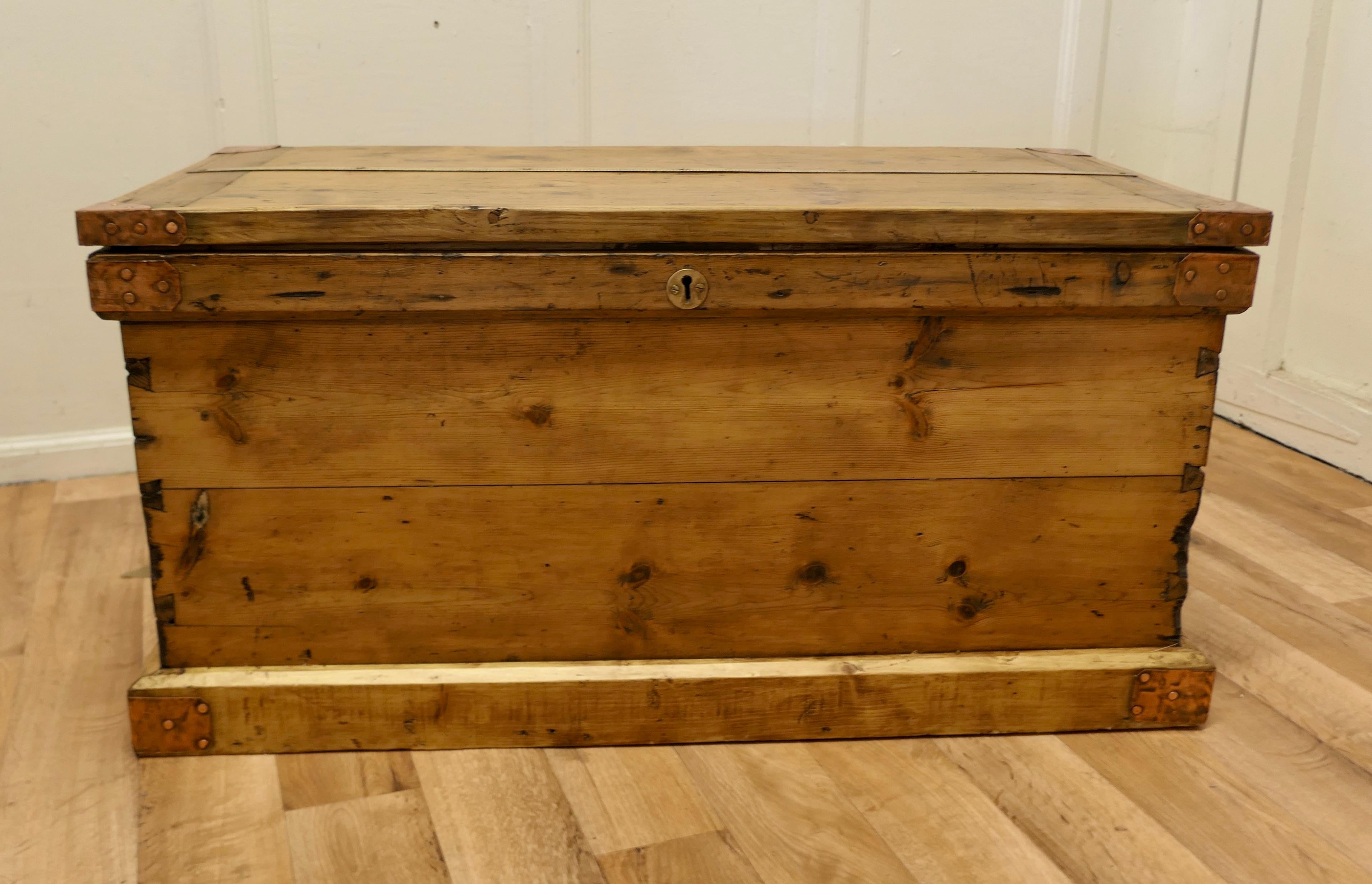 Victorian Pine Carpenters Box 

This is a heavy quality pine box it stands on a small plinth it has a brass yard measure fixed to the top with carrying handles at each end
Inside there are 4 removable divided trays and the Botton is divided