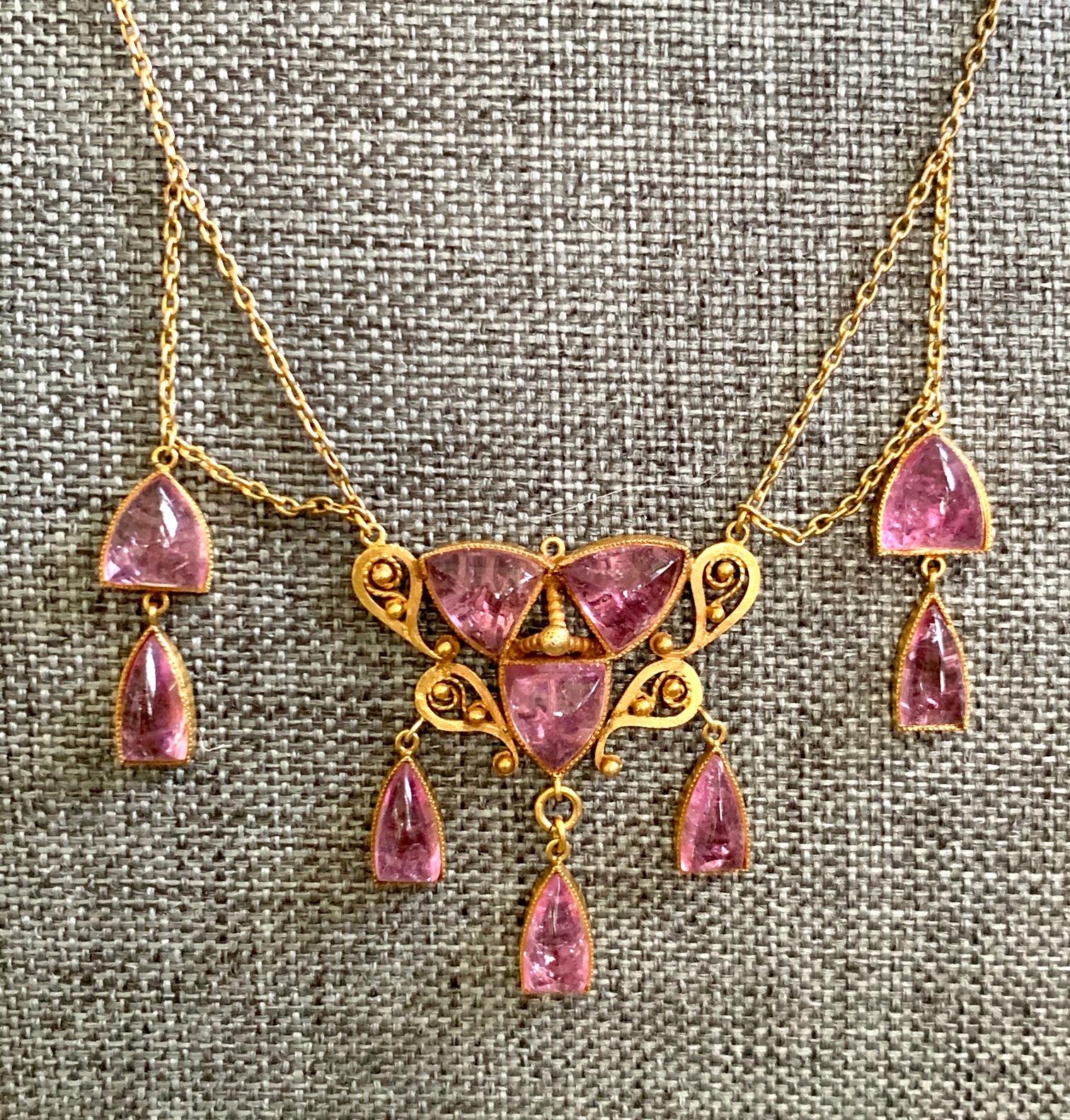 This beautiful necklace is stunning!  Bring spring time to life any time of the year with this gorgeous piece.  It would work beautifully on a v-neck or strapless dress, both of which would make this piece the center of attention.   It is made of