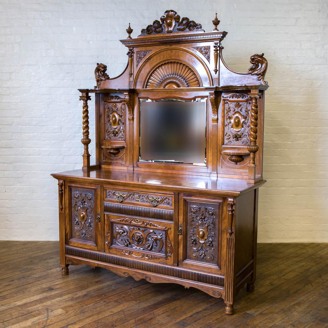 A very attractive mahogany ladies writing desk with a strong French Rococo influence. It has two side drawers and a central compartment fitted for letters and an inkwell. The top has a new tooled leather writing surface and the whole is in very good