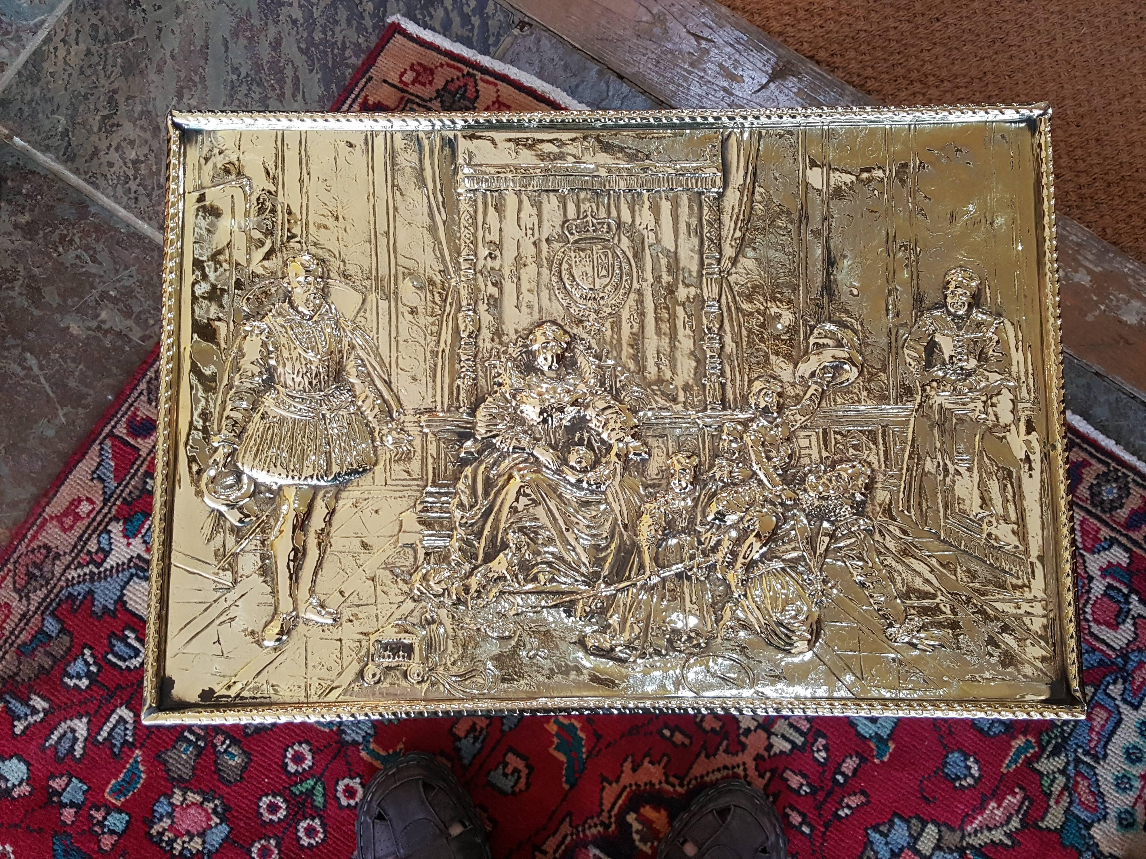 Victorian pressed brass log box with historical Elizabethan top, Heraldric sides on lion paw feet with tin liner.
Measures: 22