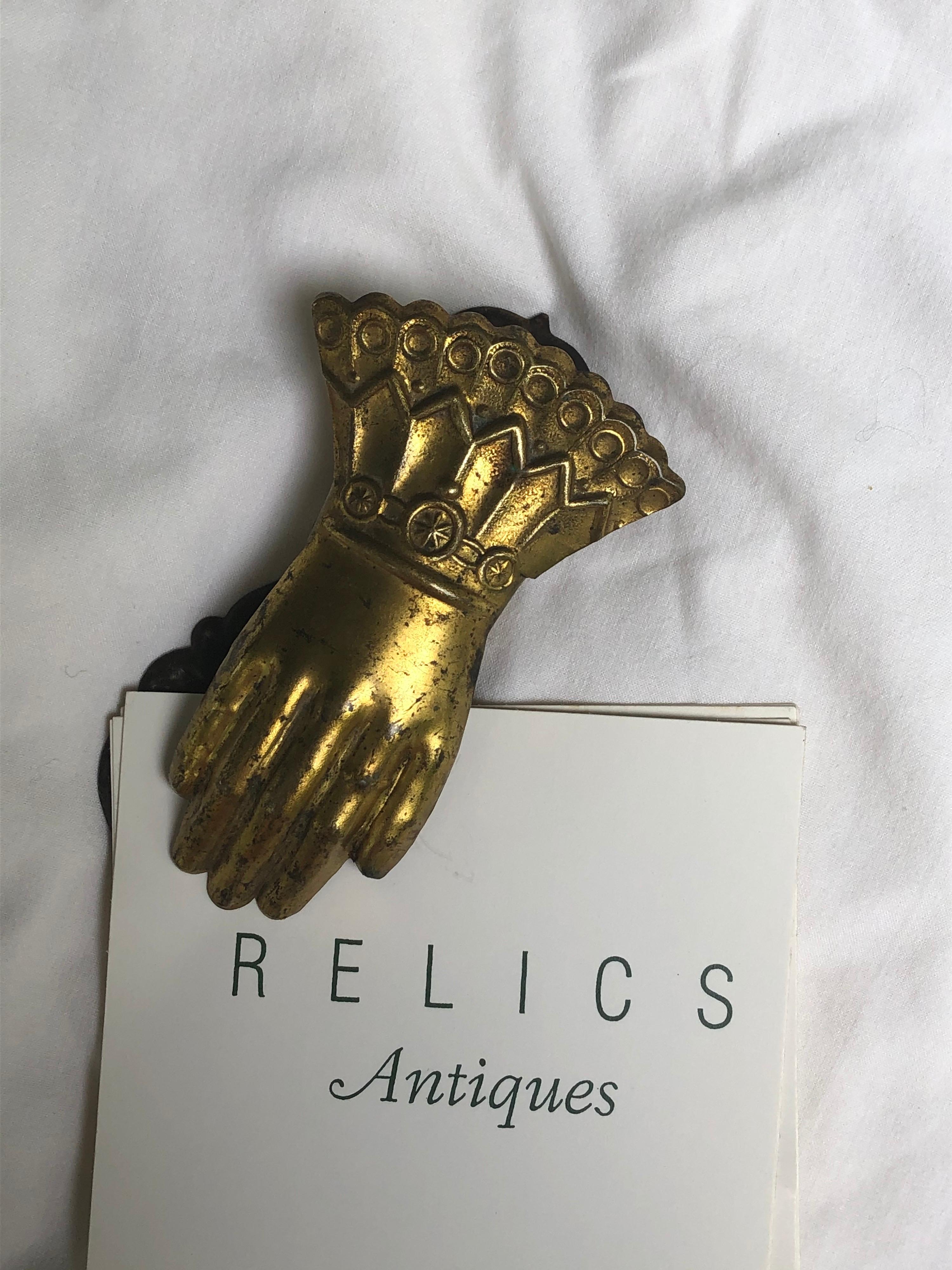 Charming gold colored pressed tin Victorian paper or note clip. Great on a desk or can be hung on the wall. English or American. Some discoloration from age and use. Clip works well.