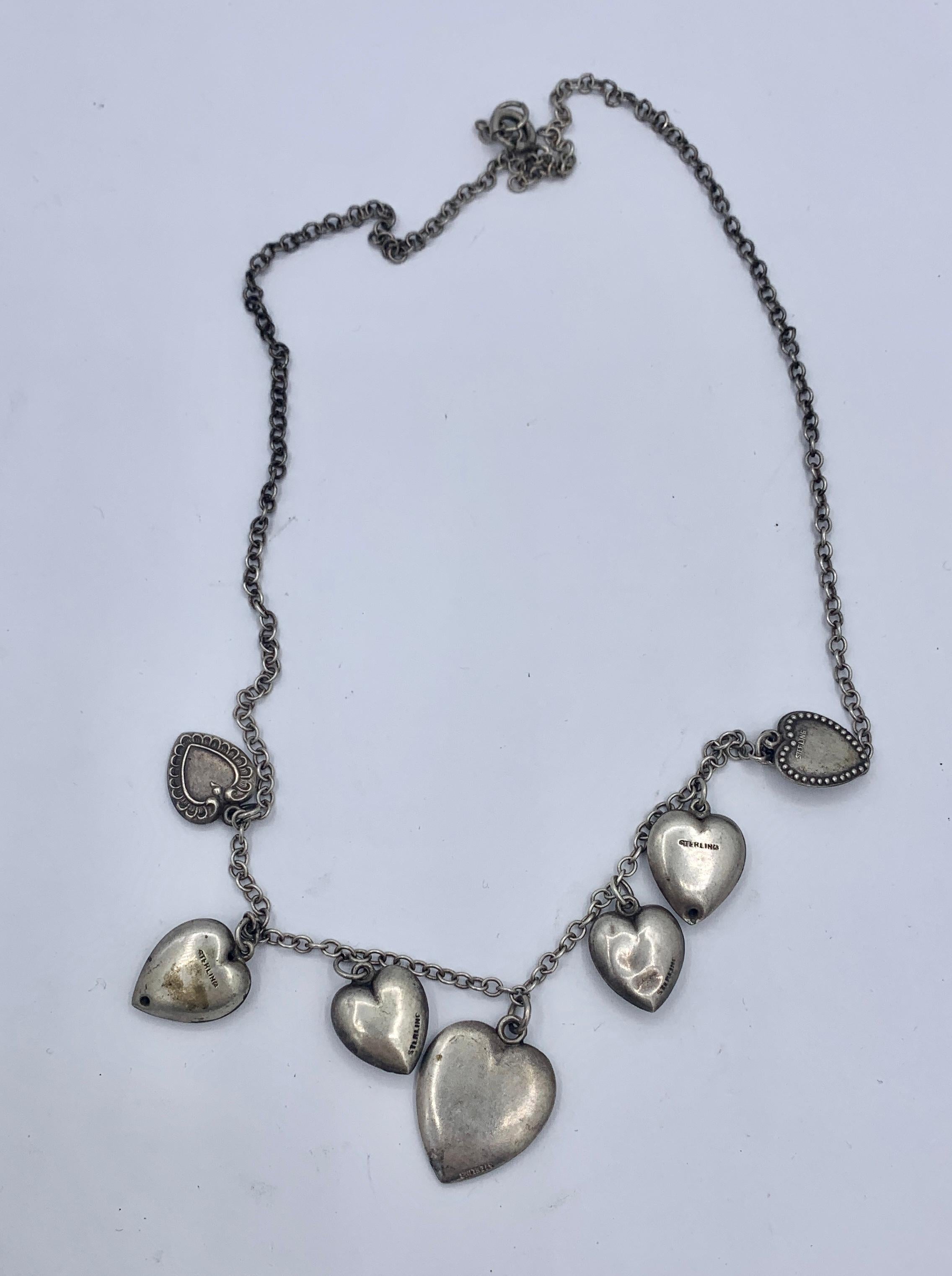 silver puffy heart necklace