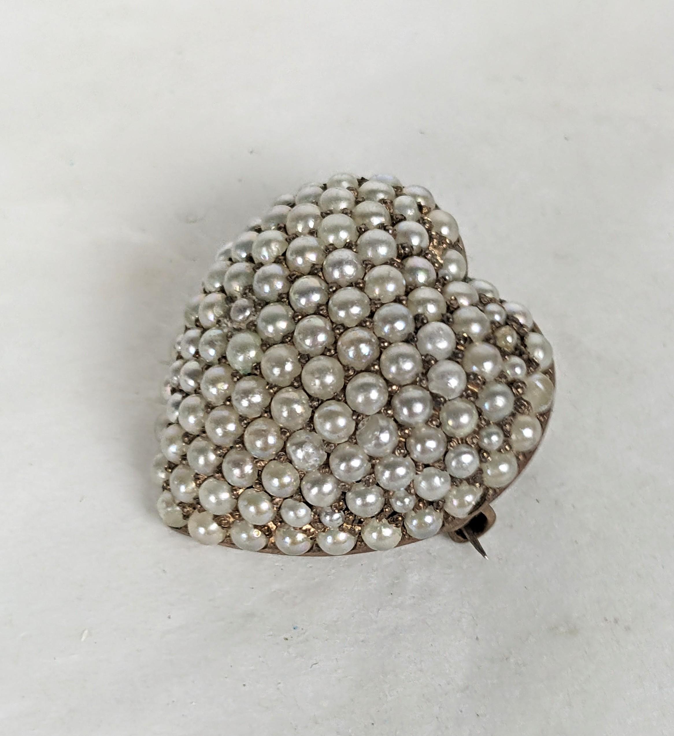 Puffy Victorian Seed Pearl Brooch-Pendant from the late 1900's. Set in sterling with pave seed pearls. Some are set with natural pearls but these are glass. 1900 USA. Marked Sterling. approx 1