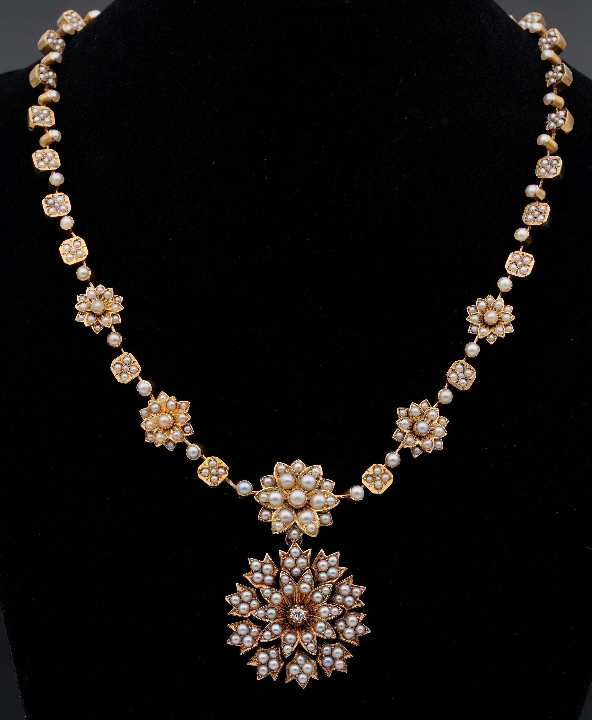 An antique pearl and diamond demi parure, 19th century in yellow gold, comprising a necklace and brooch, the necklace formed of a single row of square and floral links set with pearls, the brooch designed as a flower, set at the centre with an old
