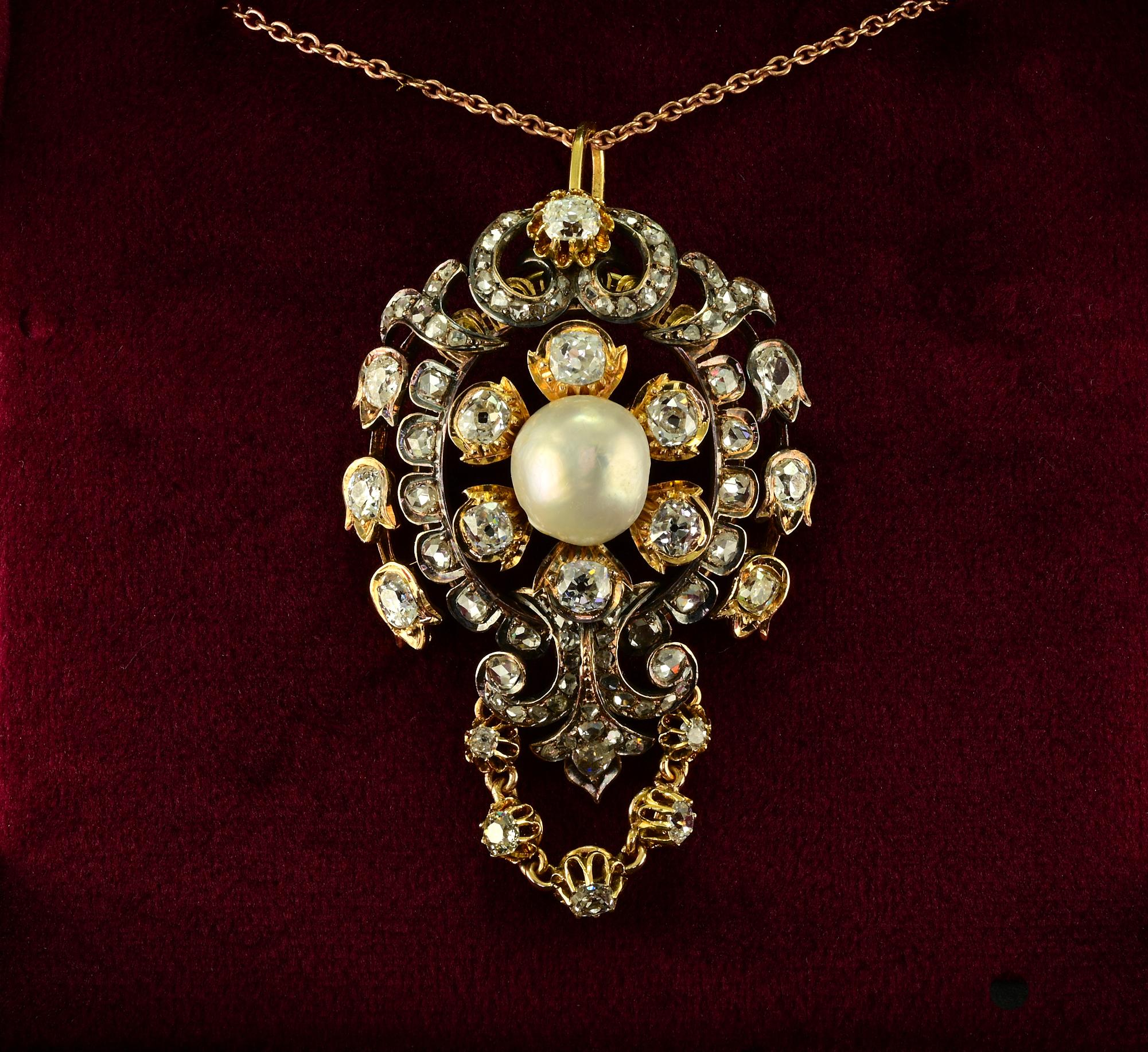 This outstanding antique Victorian era pendant is 1870 ca
Artful hand crafted in the glorious crafting of the era, 18 Kt with portions of silver topping over gold to the inner Diamond frame
Spectacular, intricate, exuberant design, overwhelmed by