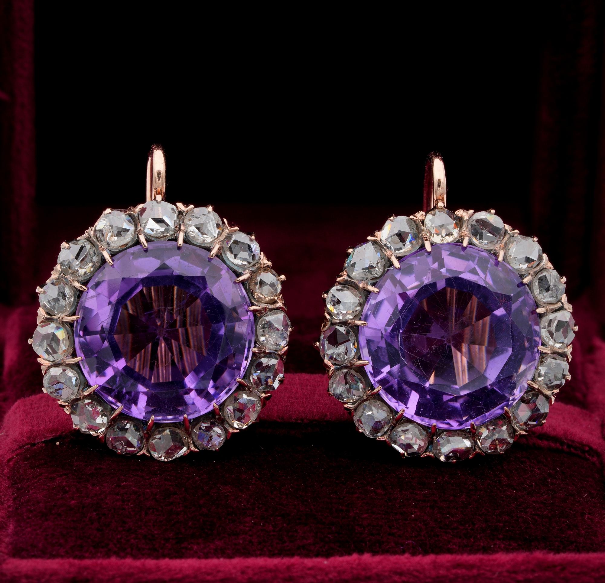 Victorian Statement Earrings

Rare Victorian period 1880 ca large sized Amethyst and Diamond Earrings
Victorian period statement earrings to wear and collect proudly
Hand crafted of solid 18 Kt gold
Holding two large sized approx 24.00 Ct natural