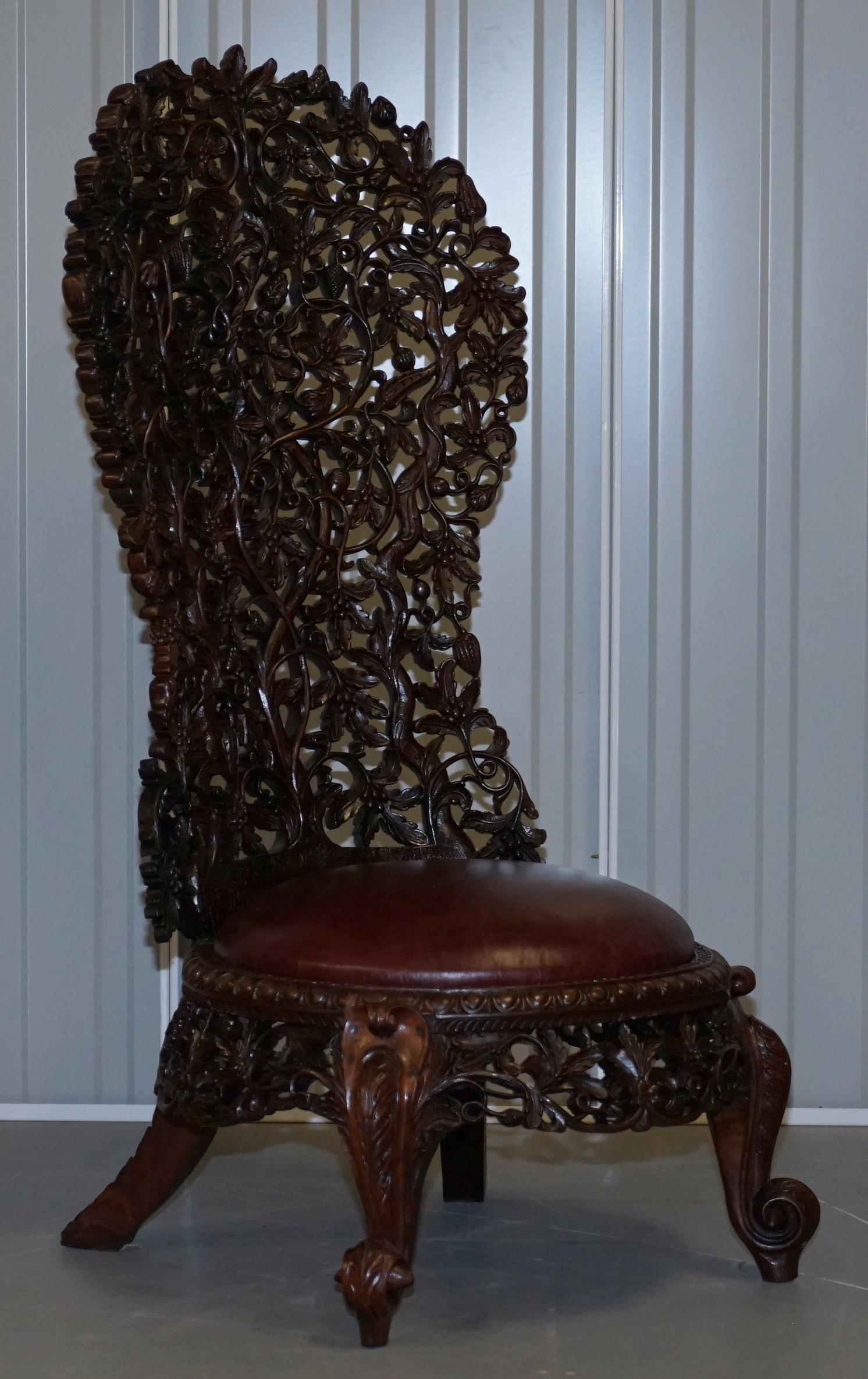 We are delighted to offer for sale this is for an original pair of solid rare wood with new oxblood leather seats “His & Hers” pair of Anglo-Indian Burmese hand carved high back chairs

A very rare find, you see singles pop up every now and again