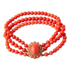 Bracelet à plusieurs rangs de perles en or 14 carats et corail rouge