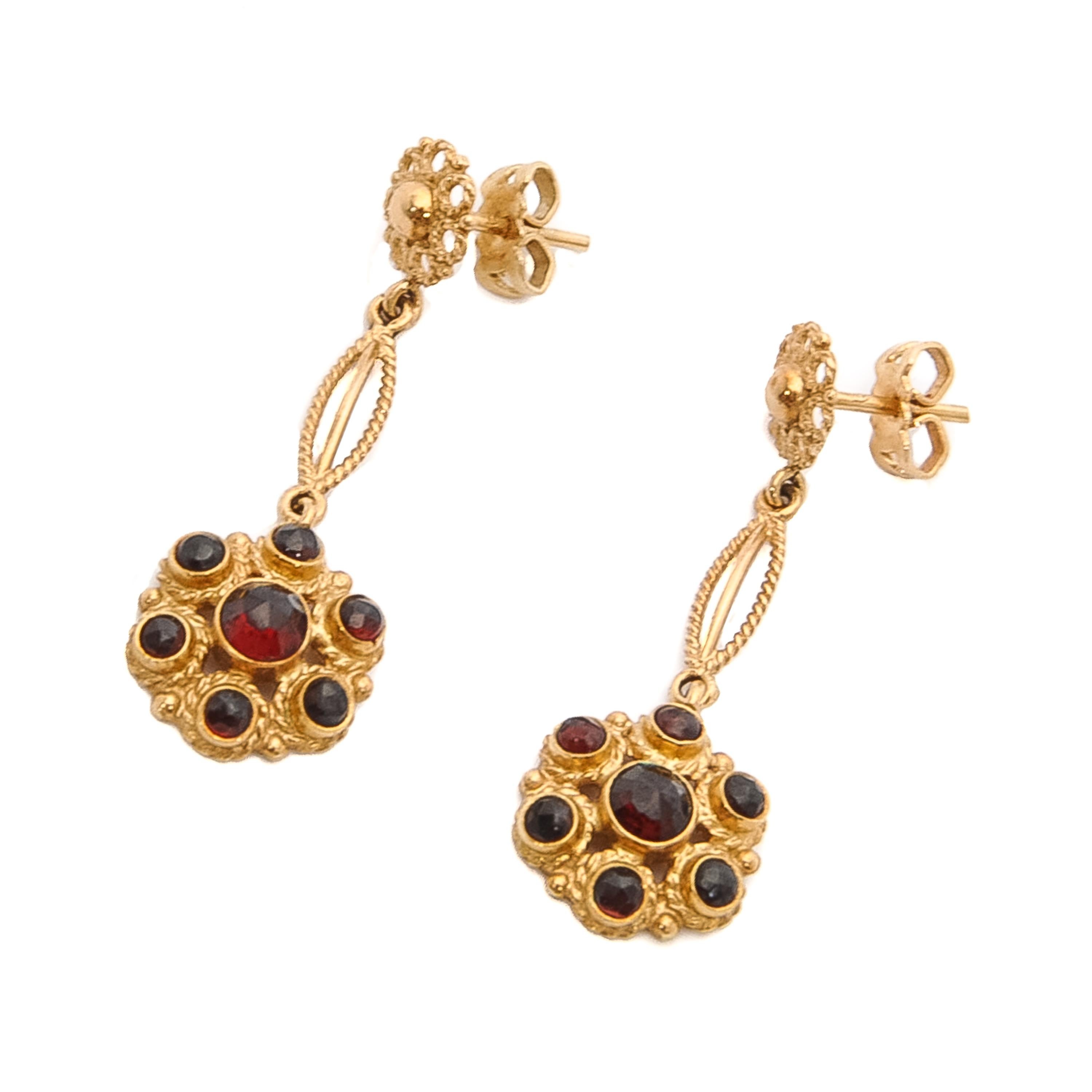 garnet dangle earrings yellow gold