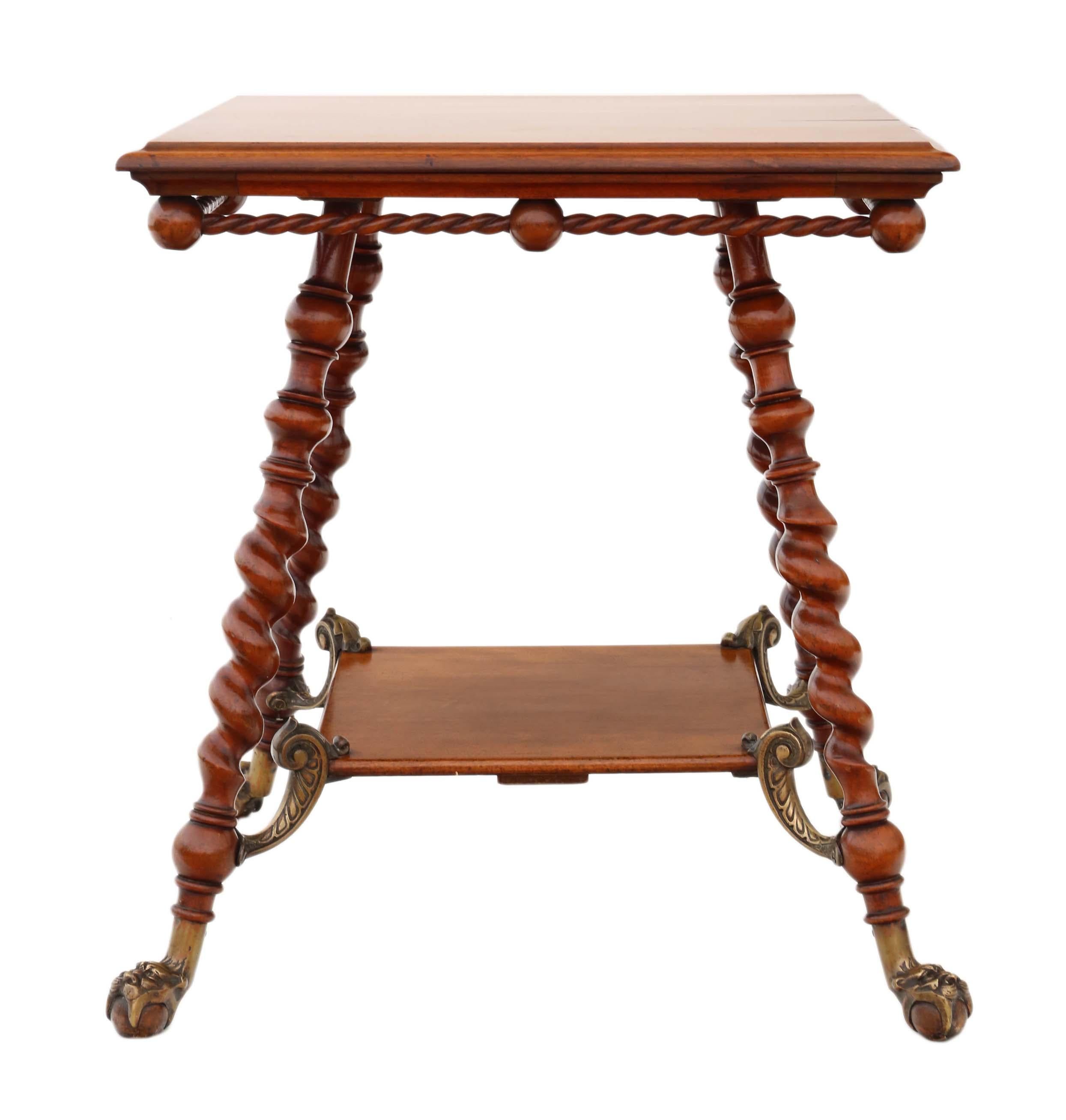 Antique rare fine quality Victorian, circa 1880-1900 red walnut and brass centre table.
Solid, heavy and strong with no loose joints. Stands on attractive twist legs with wooden ball and brass lion feet.
Would look great in the right location! No