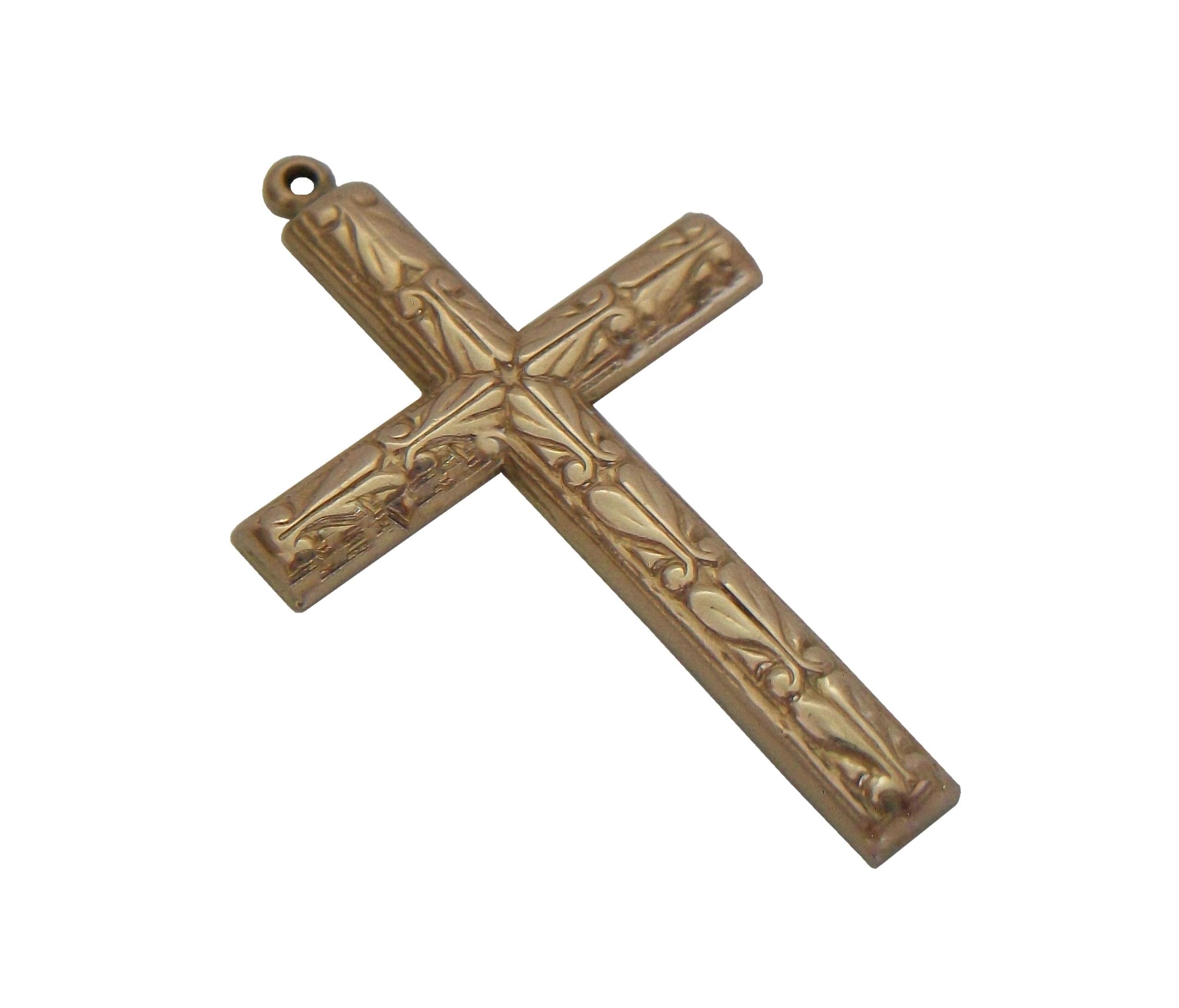 Antique Renaissance Revival 14K yellow gold cross pendant - featuring an embossed laurel leaf pattern over the convex arms of the cross - flat back - unsigned - acid tested for gold purity - Europe (likely Italy) - circa 1900.

Excellent antique