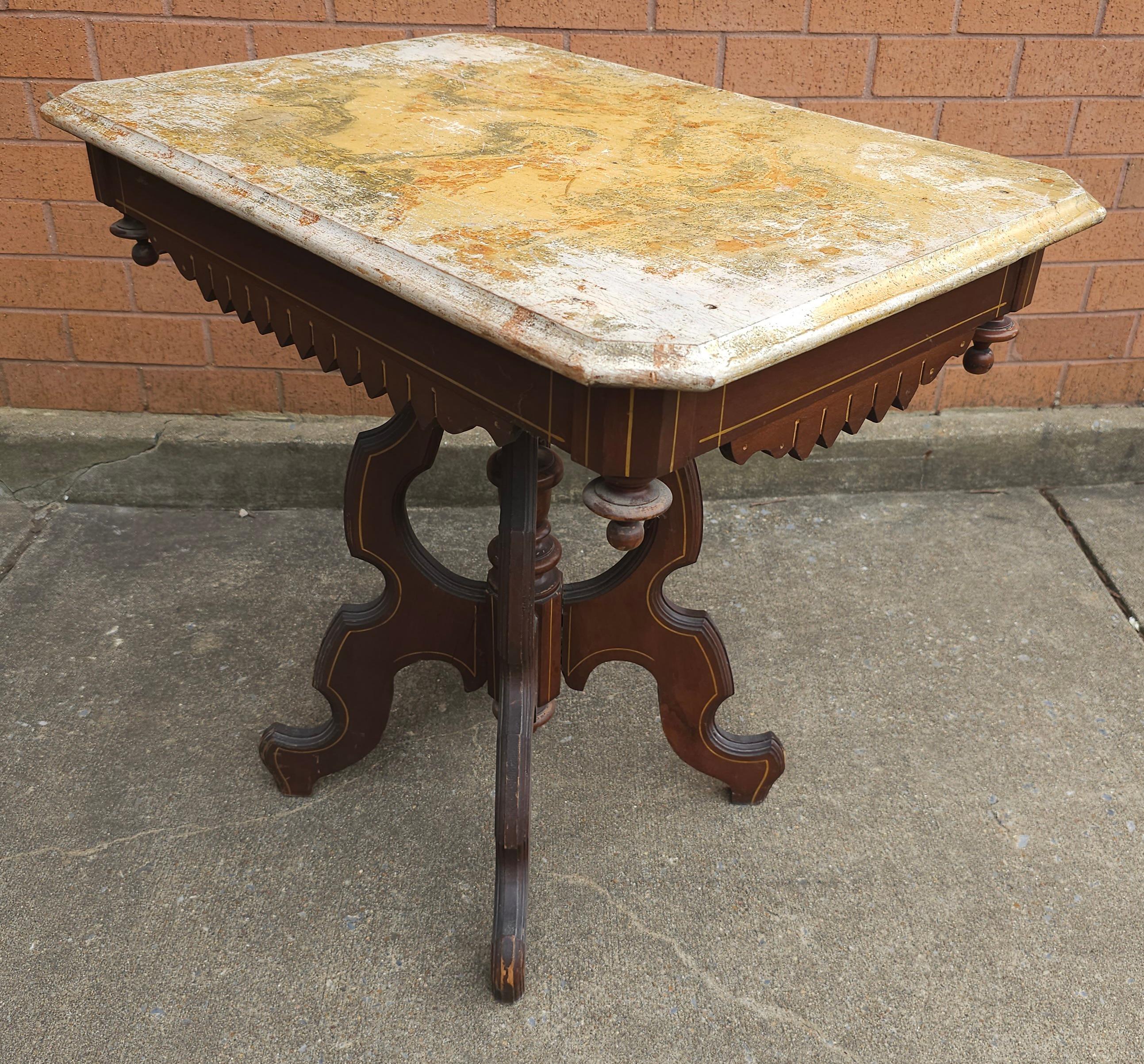 A Victorian Renaissance Style Walnut washed out Painted Side Table. Measures 29