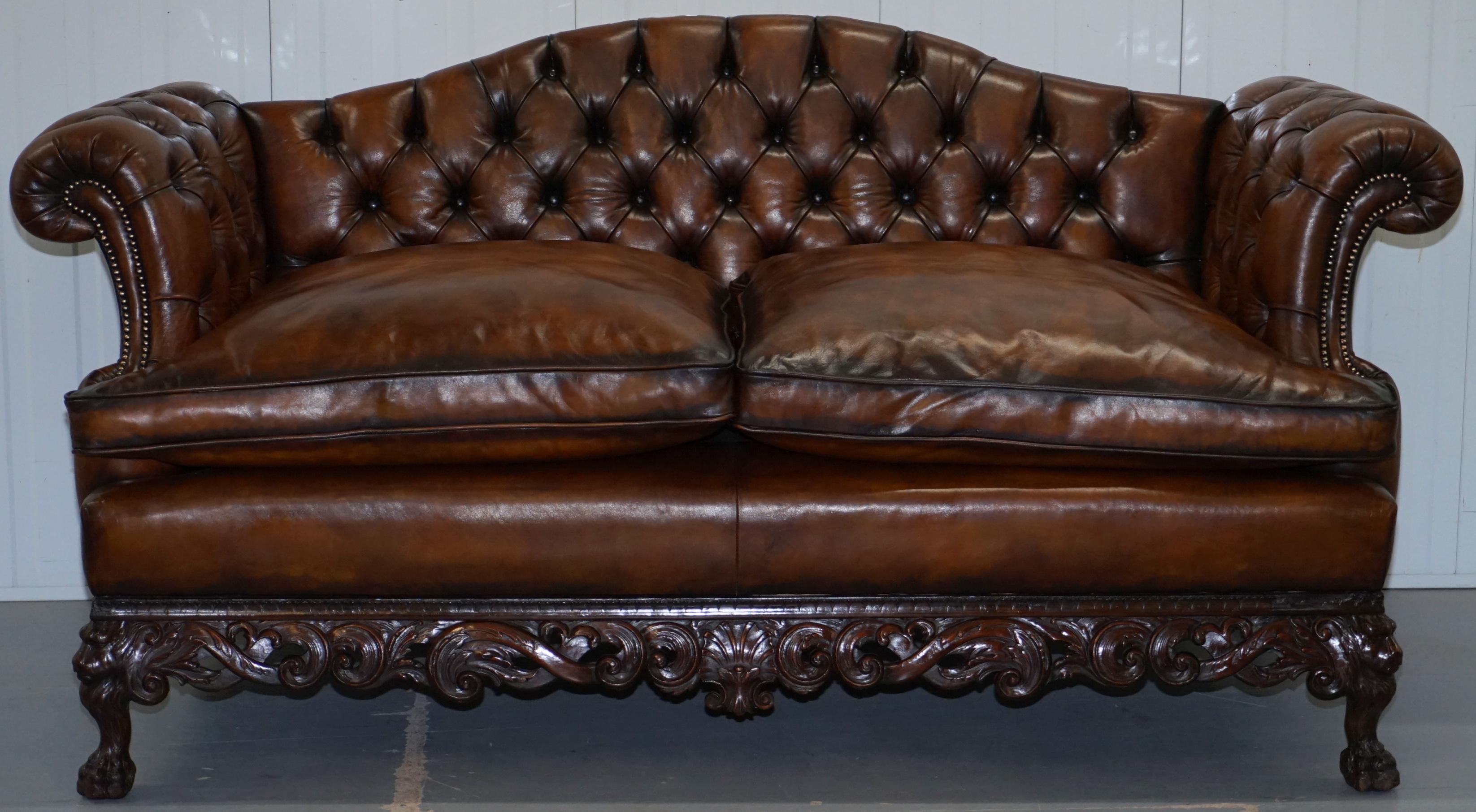 We are delighted to offer for sale this very rare fully restored George II style late Victorian hand carved with Lion hairy paw feet Chesterfield brown leather sofa

Please note the delivery fee listed is just a guide, it covers within the M25