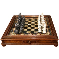Victorian Reverse Painted Chess Board with Associated Chess Set