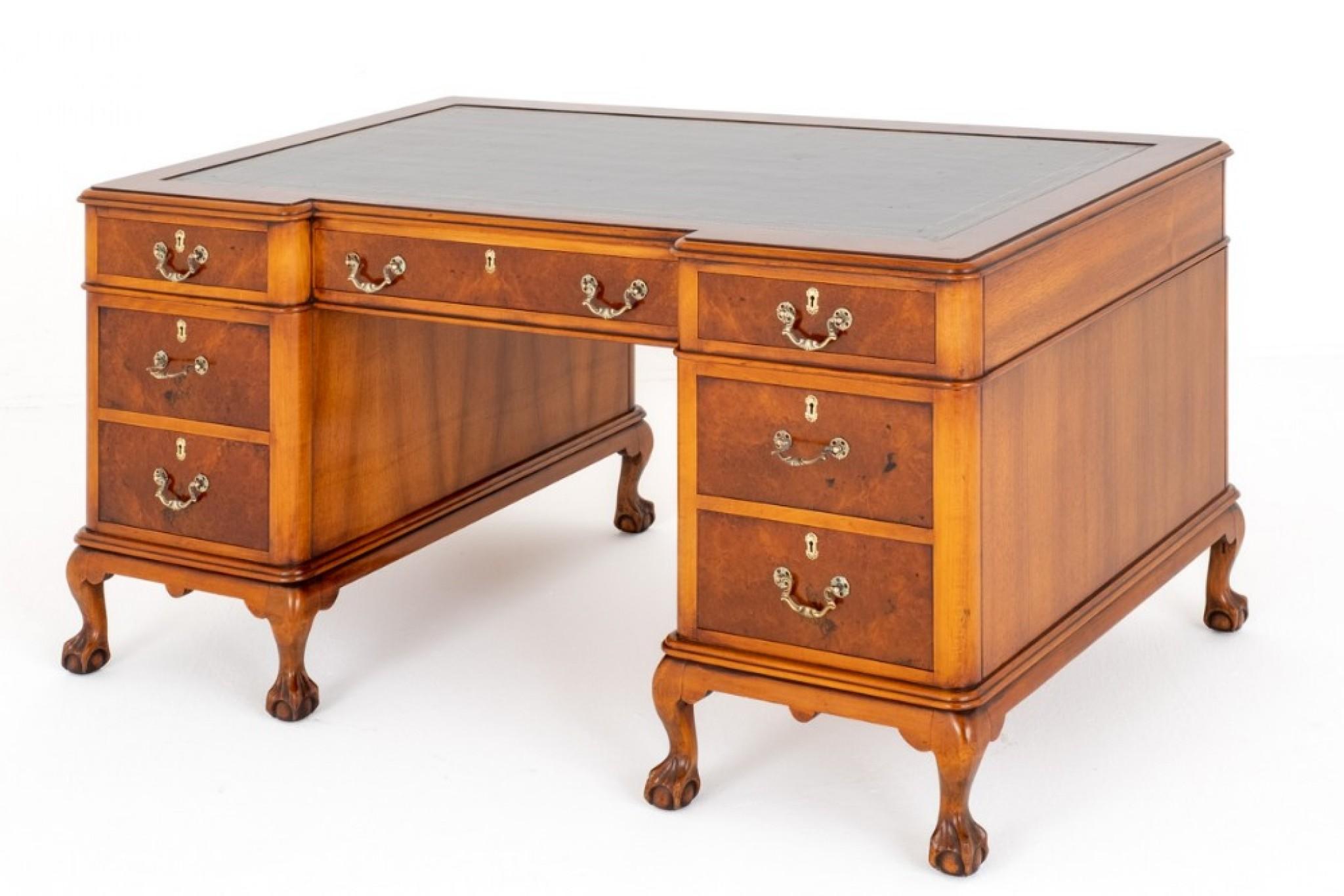 Victorian revival Walnut Pedestal Desk.
This Desk Stands Upon Cabriole Legs with Carved Ball and Claw Feet.
Circa 1920
Having an Arrangement of 7 Mahogany Lined Drawers.
The Drawers Featuring Burr Walnut Timbers and Retain Their
Decorative Brass