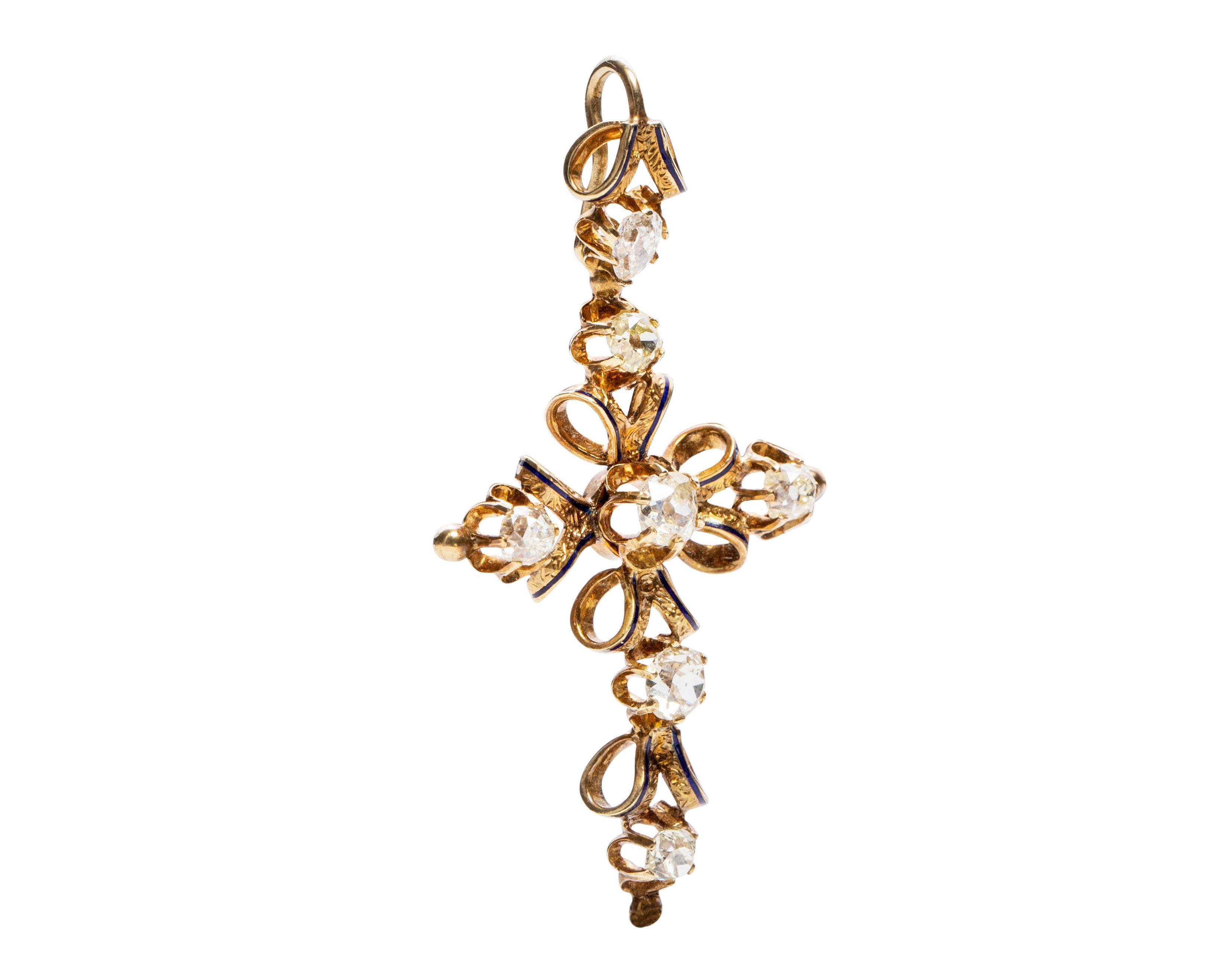 Here we have a breathtaking Antique Ribbon design French Cross pendant, this cross is adorned with 6 beautiful old cut diamonds that have a lot of life, with a warm hue. This cross has exquisite filigree engraving and a simple line of black enamel