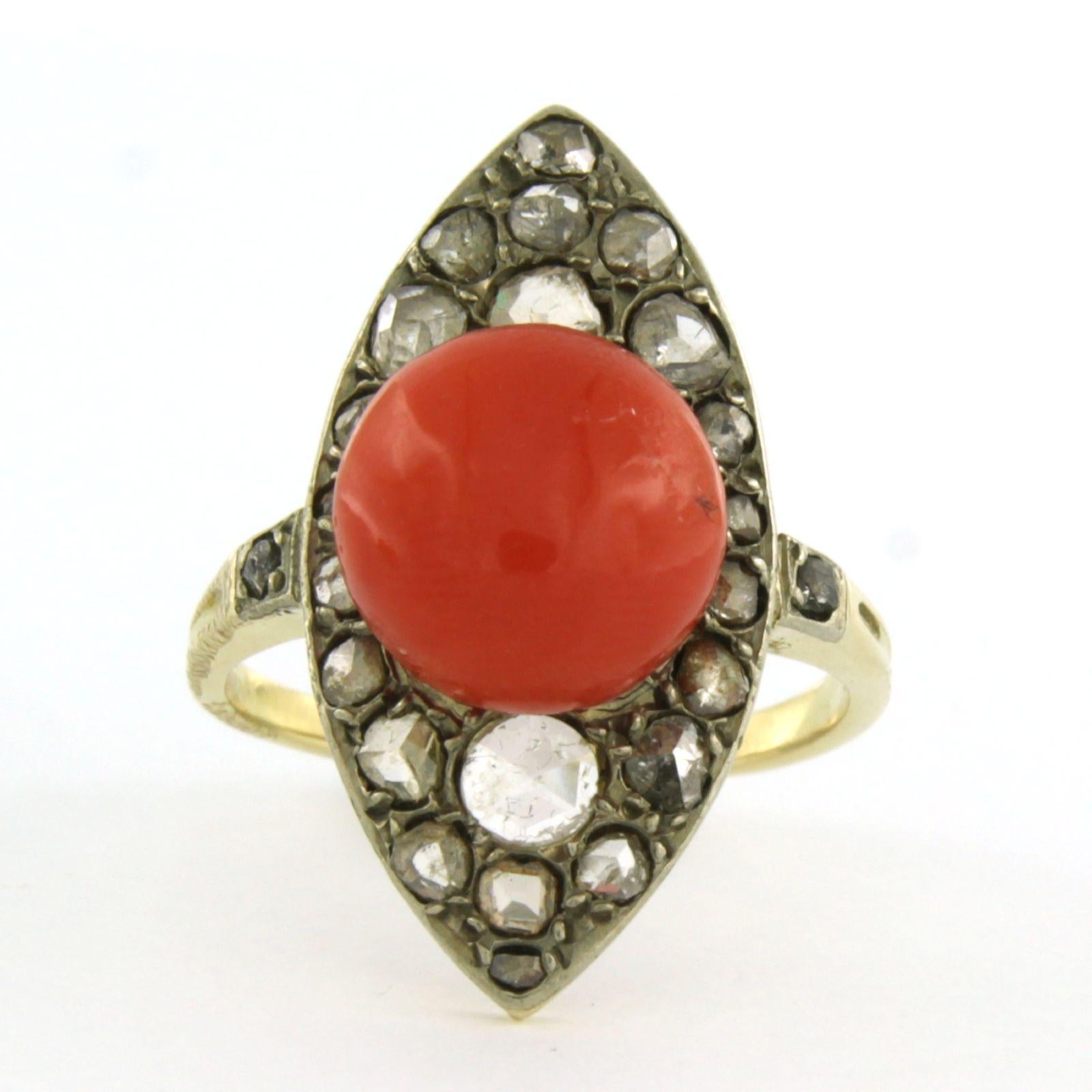 14k bicolor gold ring with coral and rose-cut diamonds up to approximately 0.40 ct G/H SI - ring size US 8 - EU 18.25 (57)

Detailed description:

The top of the ring is 2.7 cm wide by 1.1 cm high.

Ring size US 8 - EU 18.25 (57). The ring can be
