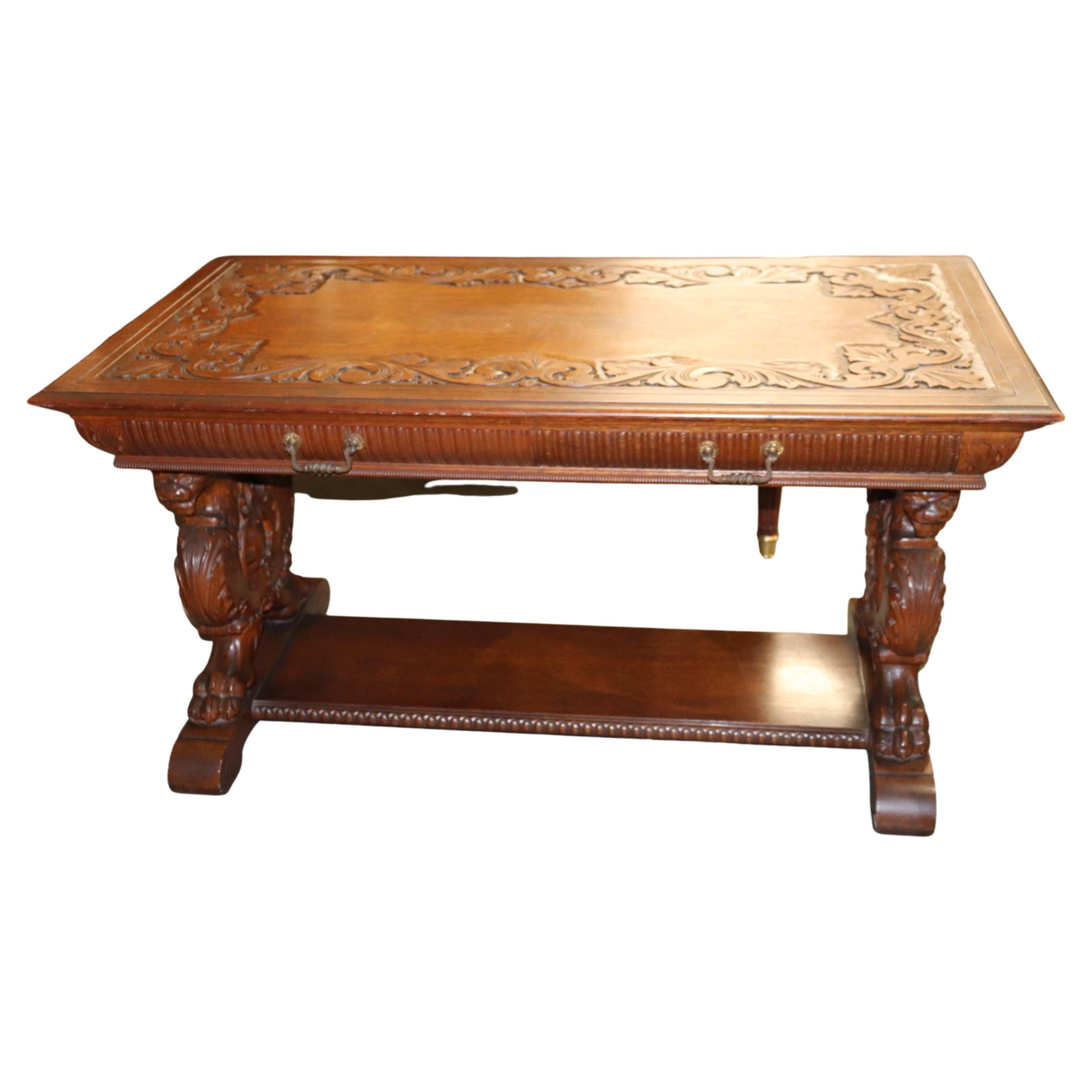 This is an iconic RJ Horner quarter sawn oak partners desk. The desk has one working drawer on each side like these desk all do. One is false and one is working on the opposing side. The desk is in very good condition and has beautifully carved