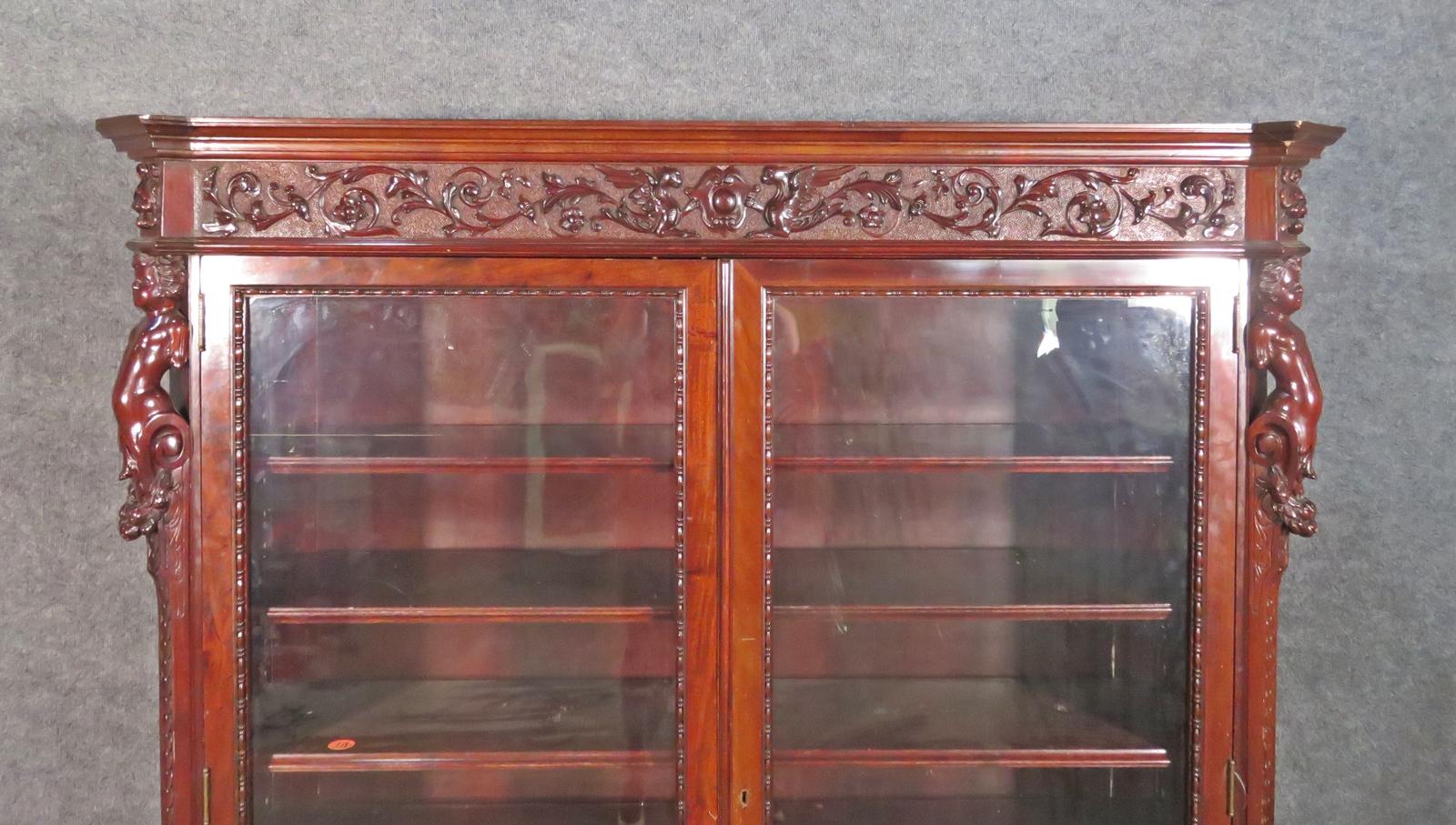 Victorian RJ Horner Solid Mahogany Bookcase Figural Full Bodied Cherubs C1890 In Good Condition In Swedesboro, NJ
