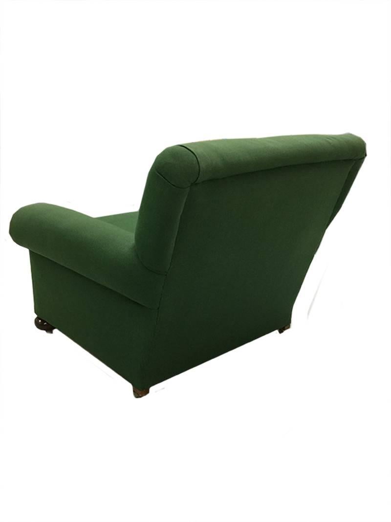 An English 19th Century green deep seated club roll arm chair

An antique deep seated club chair with green fabric upholstery with roll arms on round feet with castors
The height is 90 cm, 96 cm wide and the depth is 75
Seat height is 45 cm
 
 