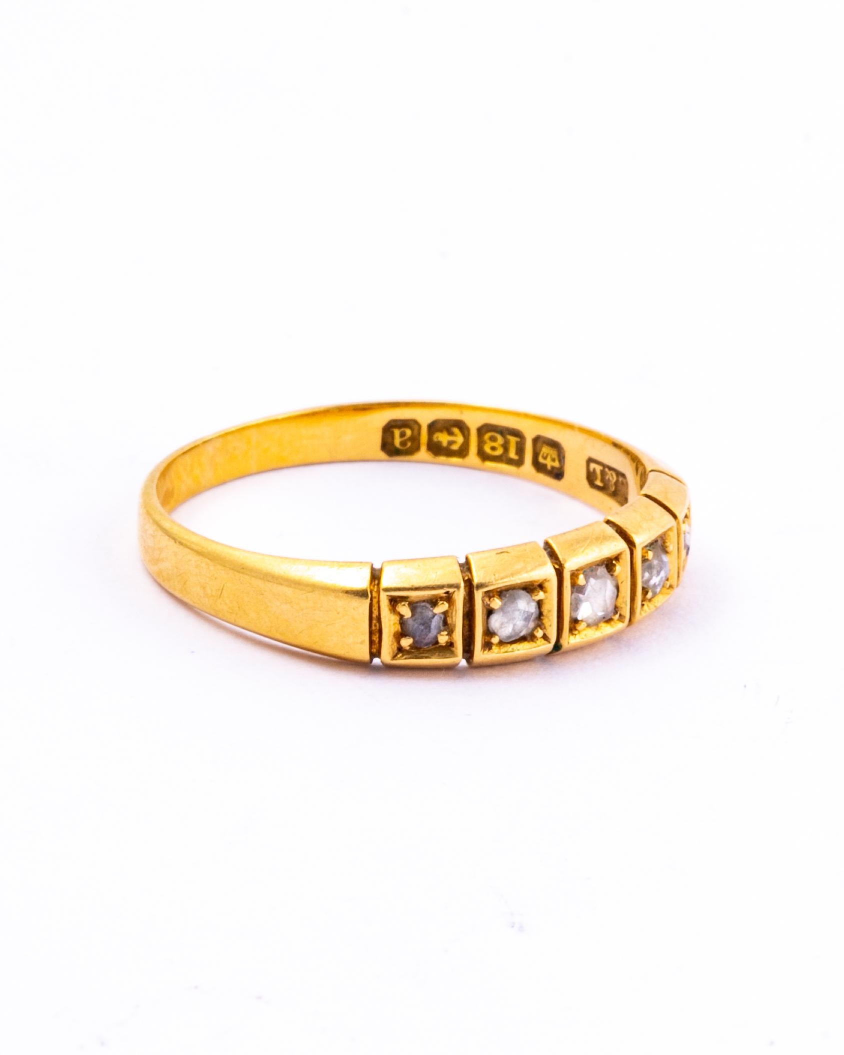 The rose cut diamonds in this band are bright and have a great sparkle. The ring is modelled in 18ct gold and the stones are set in square settings. 

Ring Size: O or 7 1/4 
Band Width: 4mm

Weight: 2.69g